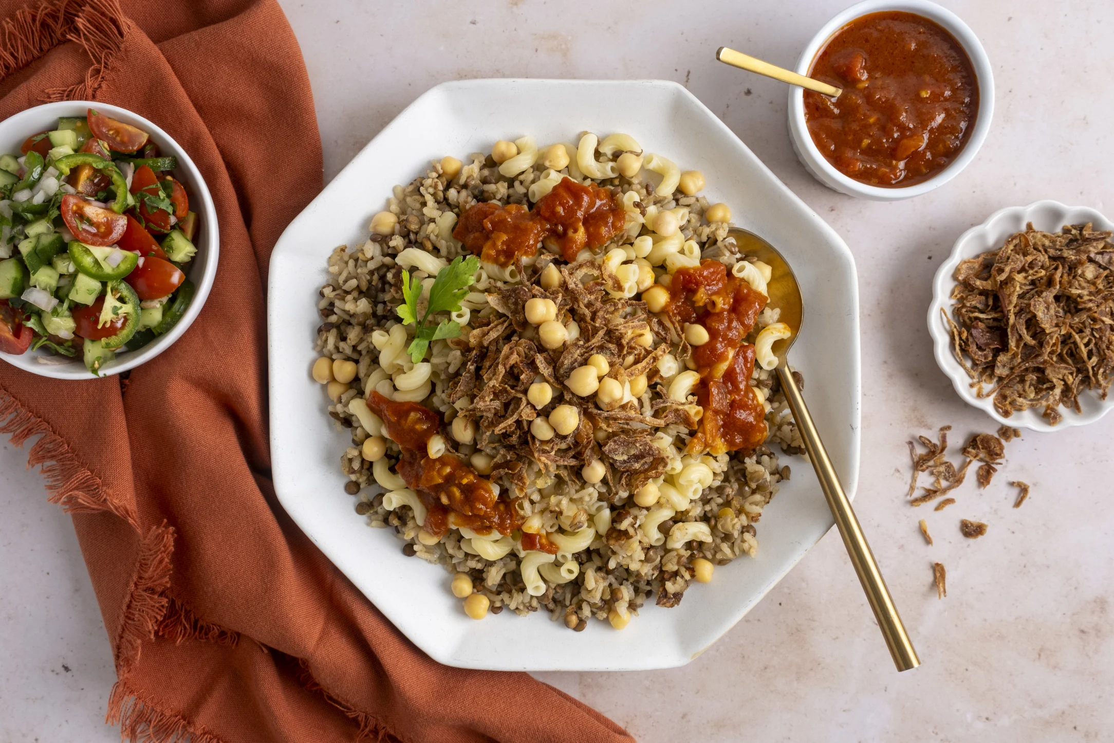 Koshari: Egyptian Rice, Lentils, Chickpeas and Pasta with a Vinegary Tomato Sauce and Chopped Salad