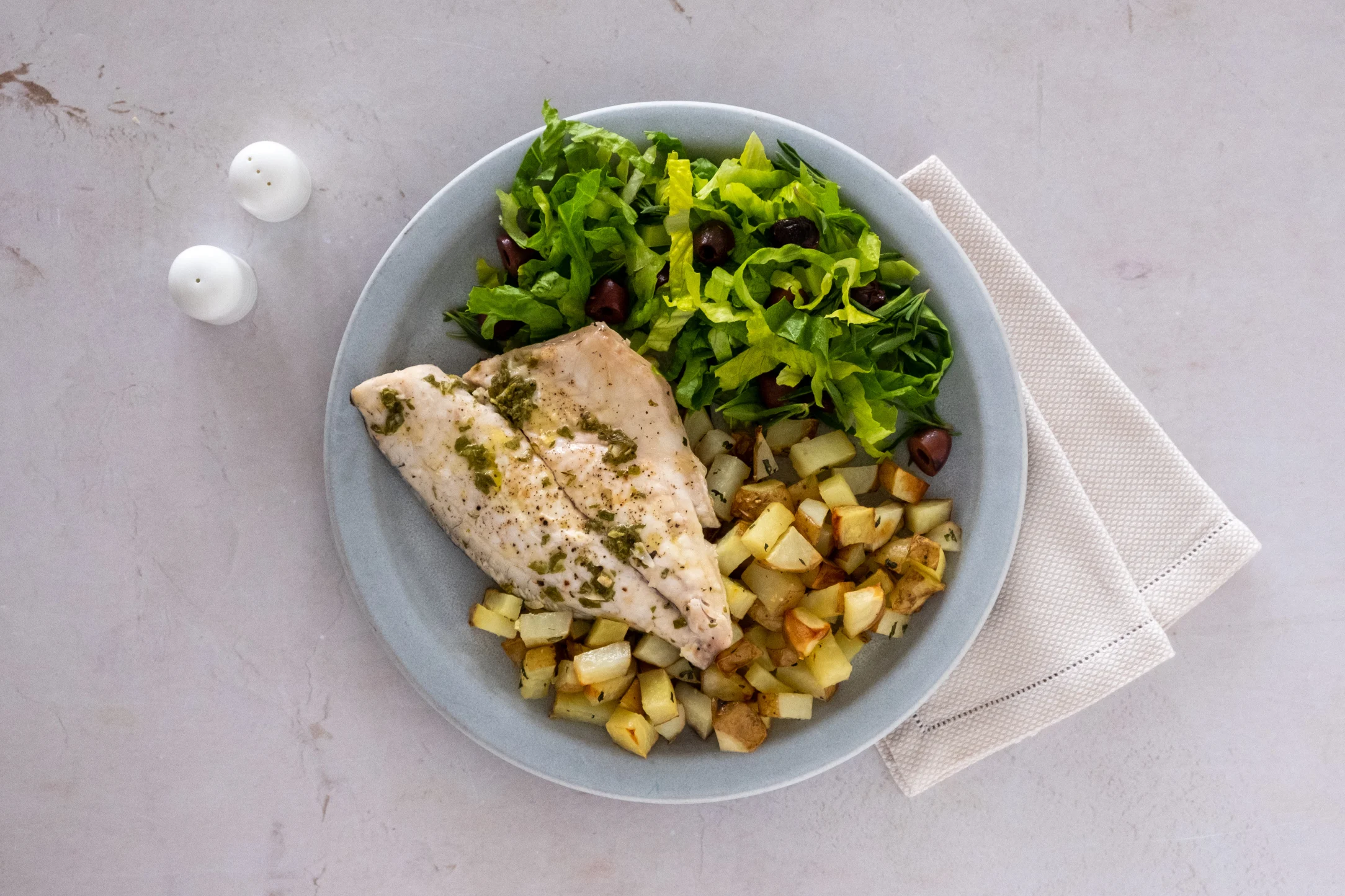 Greek Lemon Oregano Seabream with Roasted Potatoes and Olive Salad