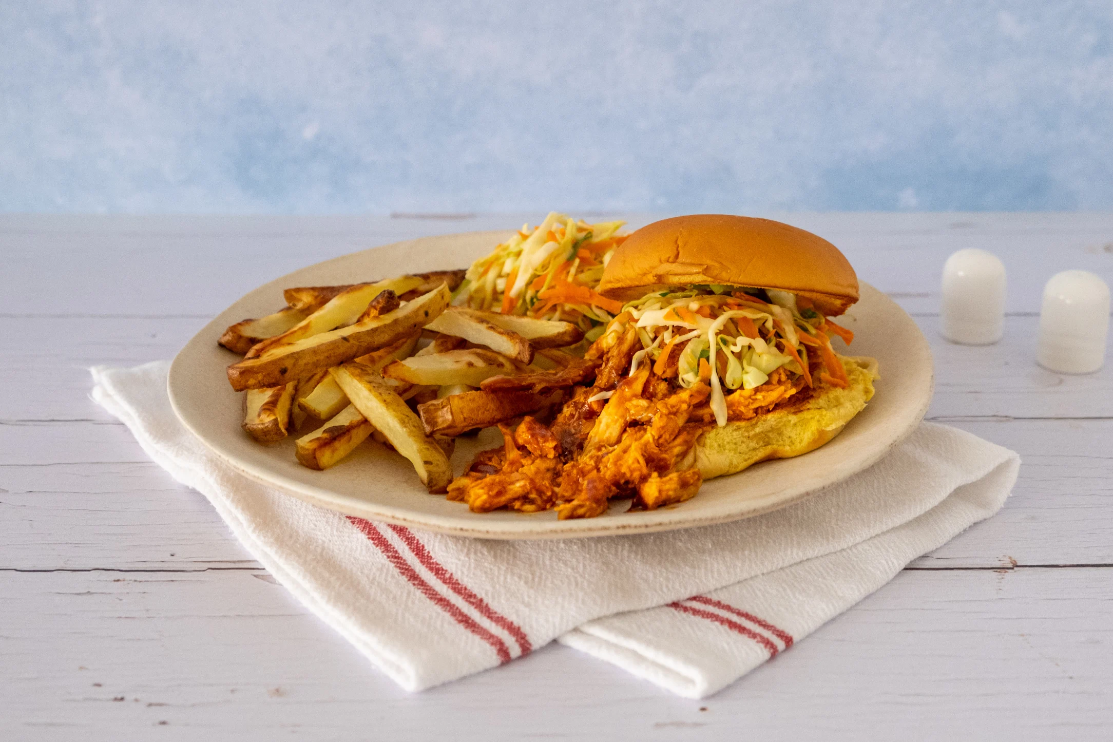 Barbecue Pulled Chicken Burger with Fries and Crunchy Coleslaw