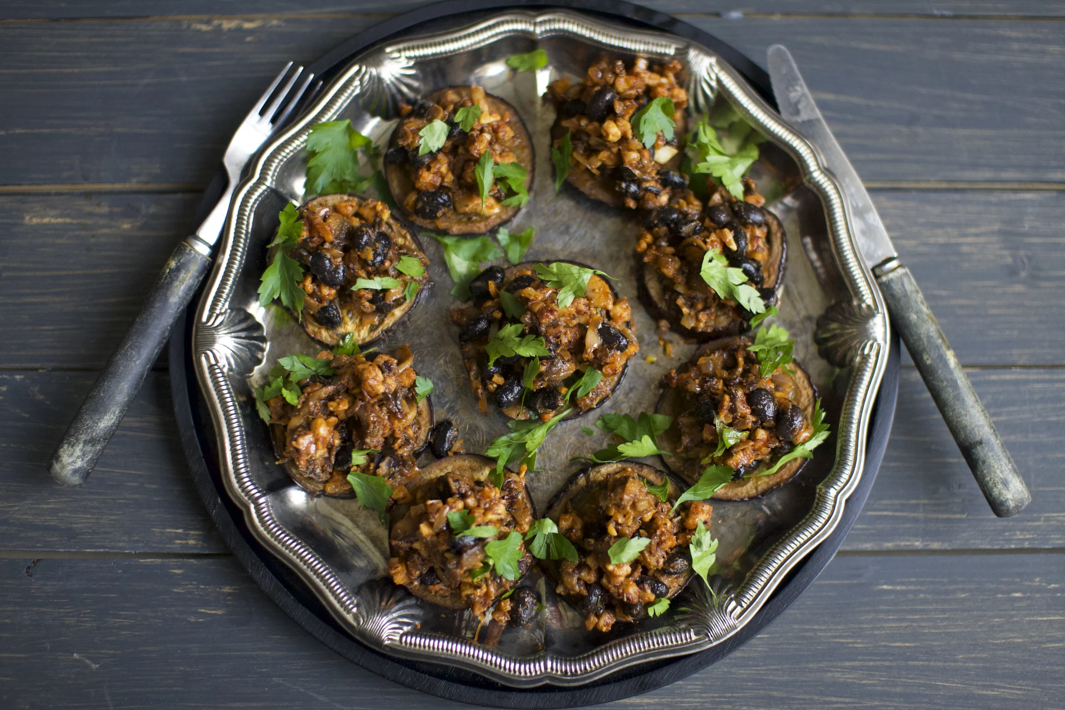 Crispy Tempeh, Mushrooms and Black Beans on Roasted Eggplant