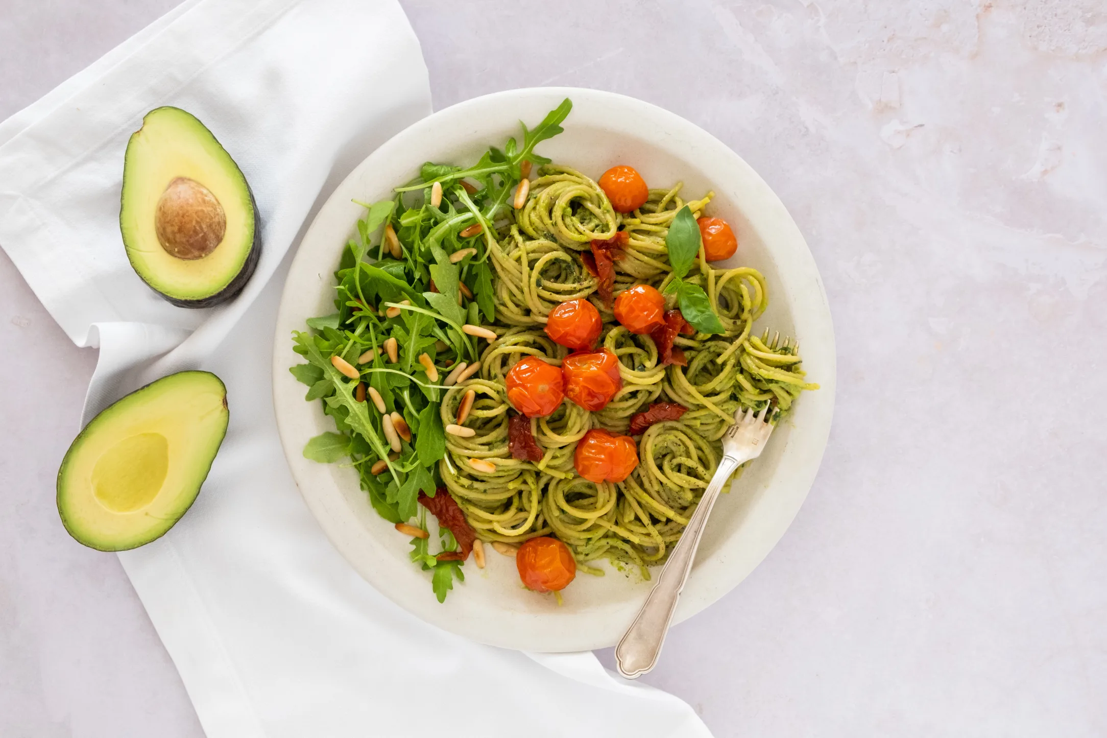 Avocado Pesto Spaghetti with Cherry Tomatoes and Pine Nuts