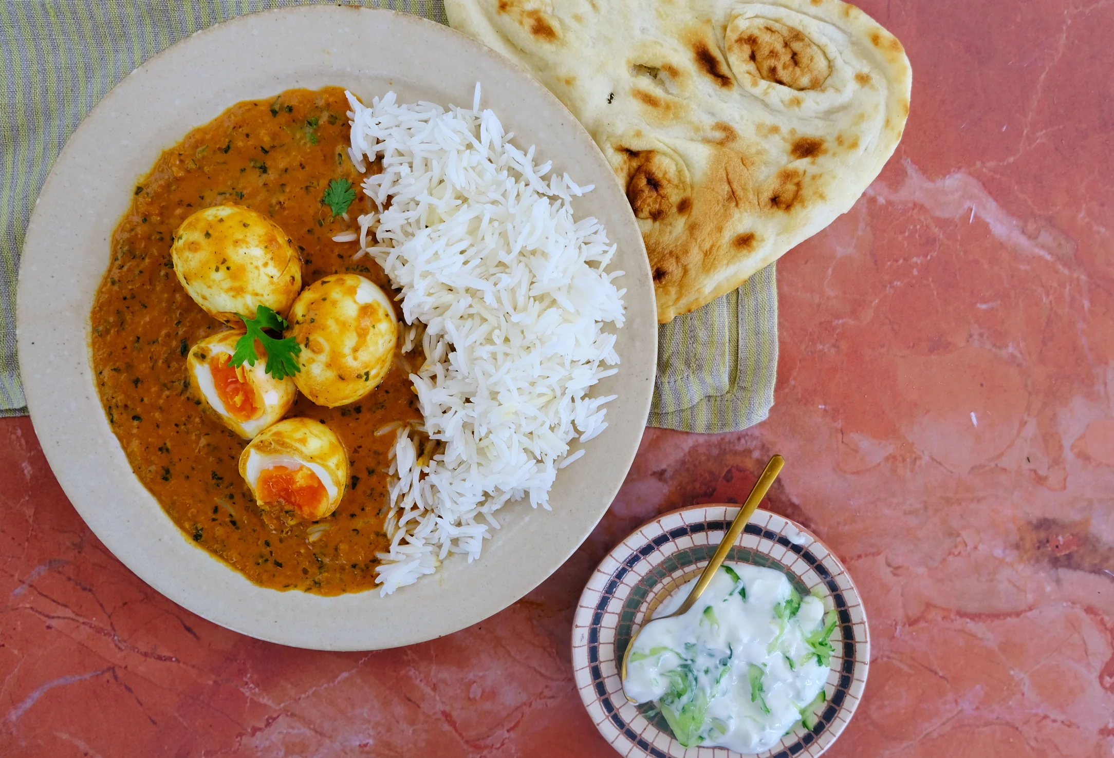 Spicy Egg Curry with Basmati Rice, Naan and Cucumber Raita