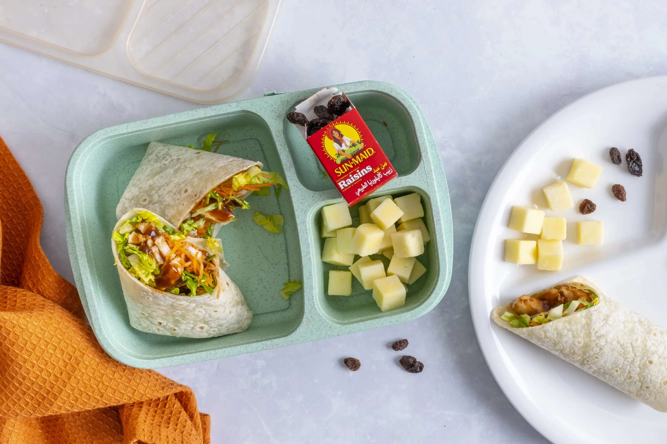 Barbecue Chicken and Salad Wrap with Mild Cheddar Cubes and Snack Raisins