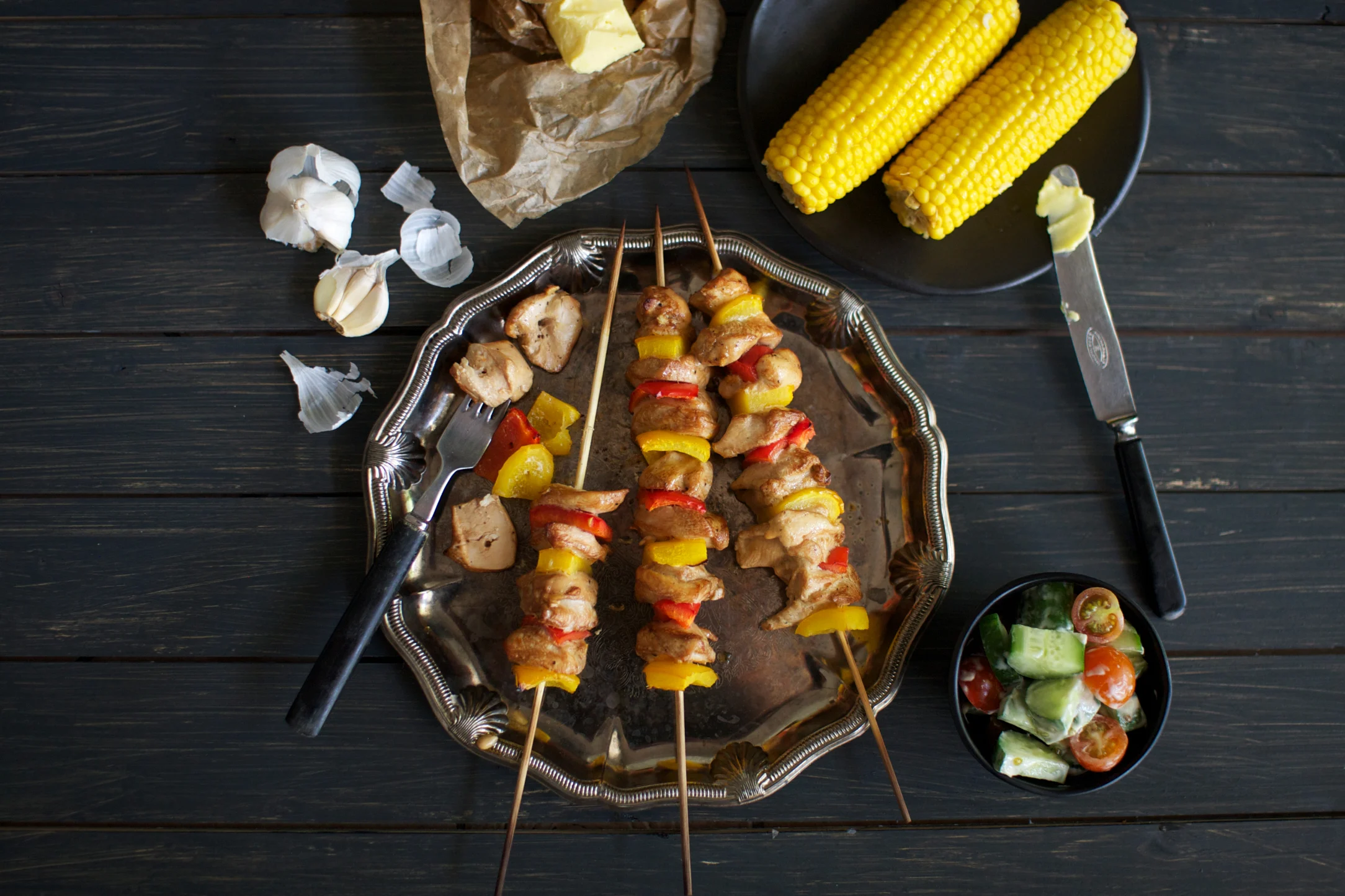 Chicken Skewers with Fresh Corn, Garlic Butter and Cucumber Salad