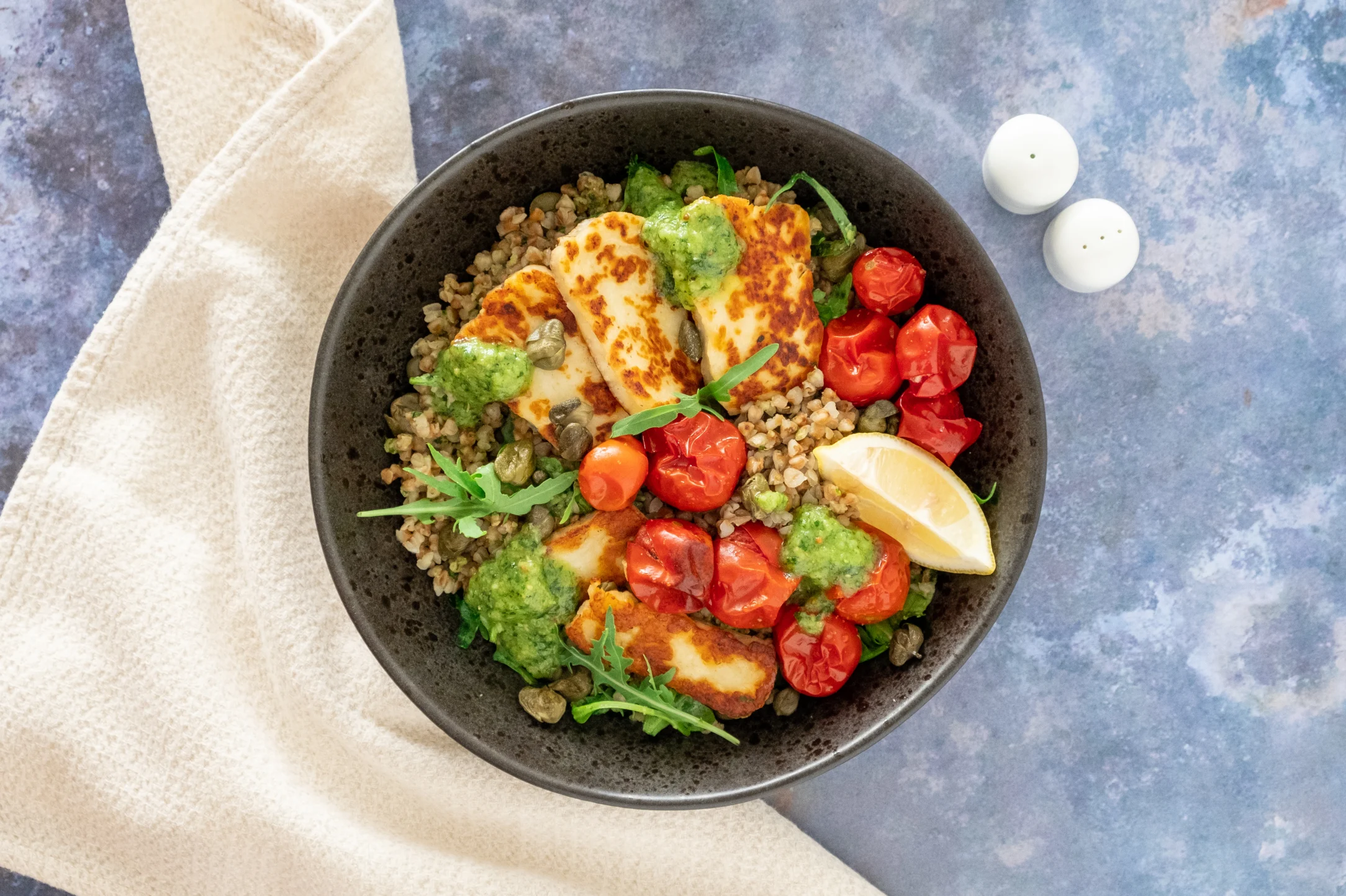 Halloumi over Slow Roasted Tomatoes with Buckwheat and Pesto