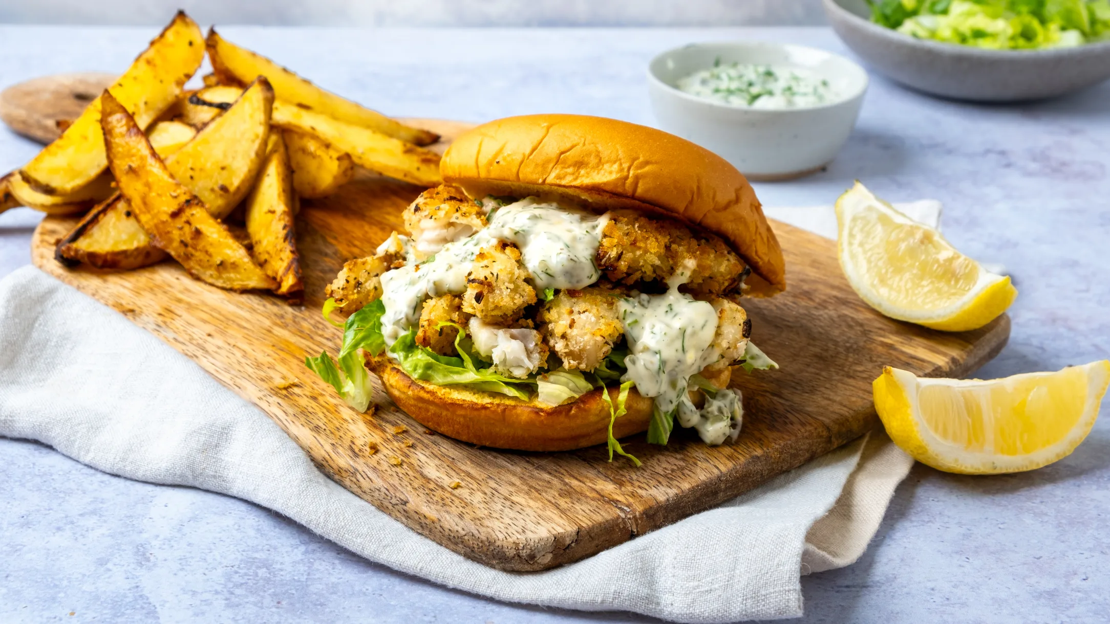 Fish Finger Sandwich with Potato Wedges and Tartare Sauce