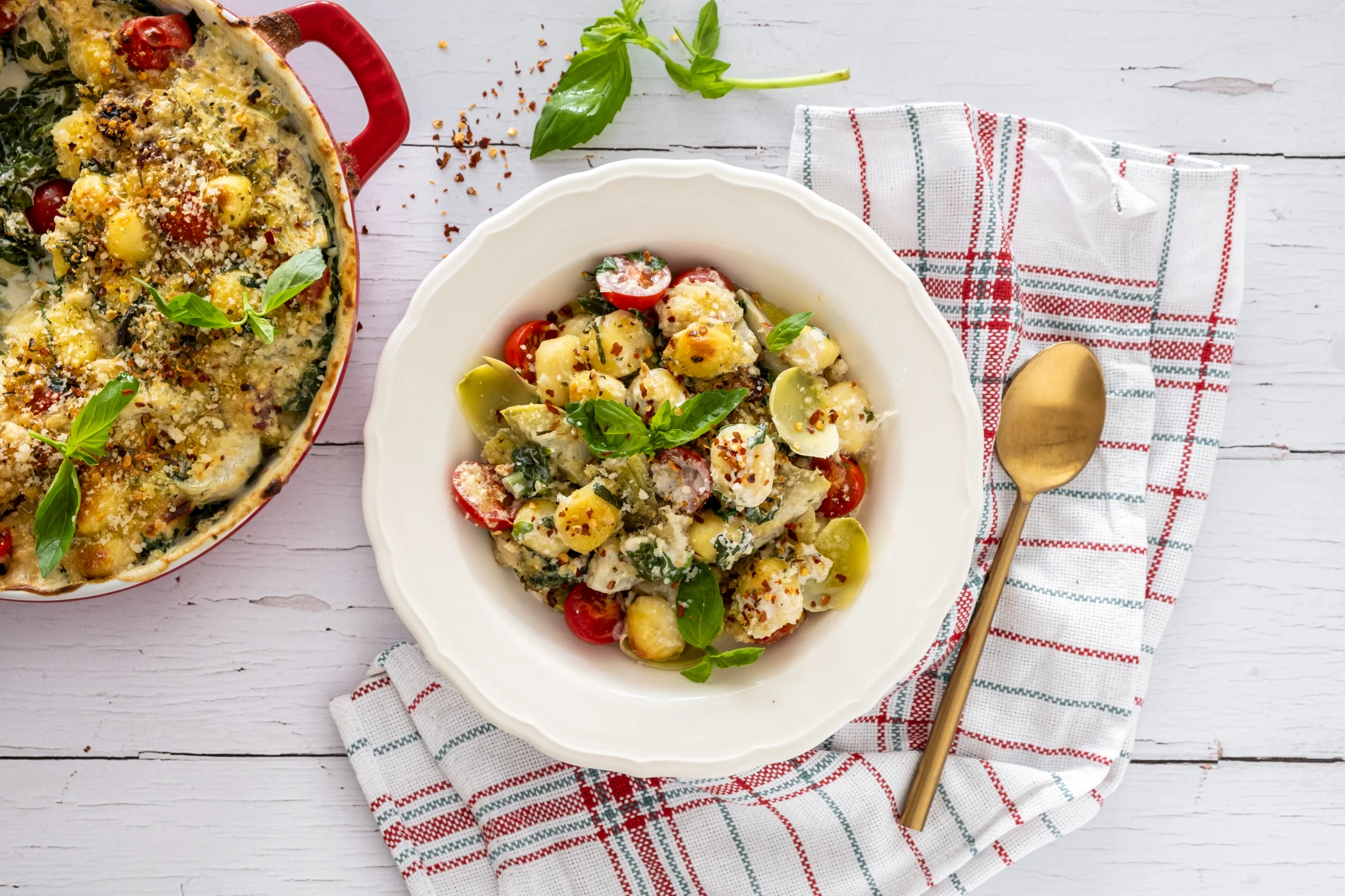 Baked Artichoke and Spinach Gnocchi with Crispy Parmesan and Basil