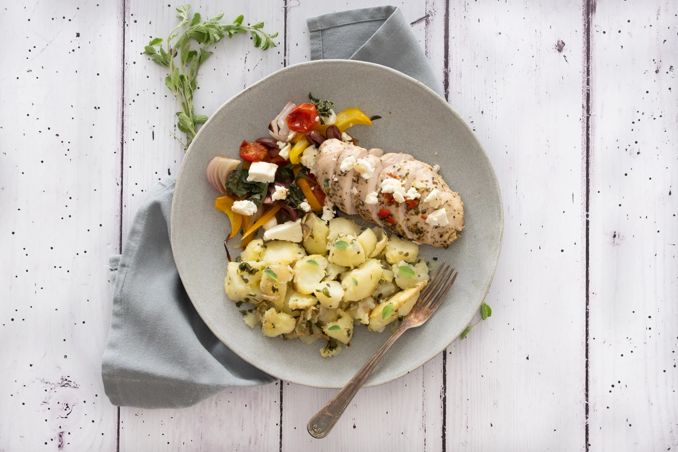 Greek Chicken Traybake with Lemon and Oregano Smashed New Potatoes