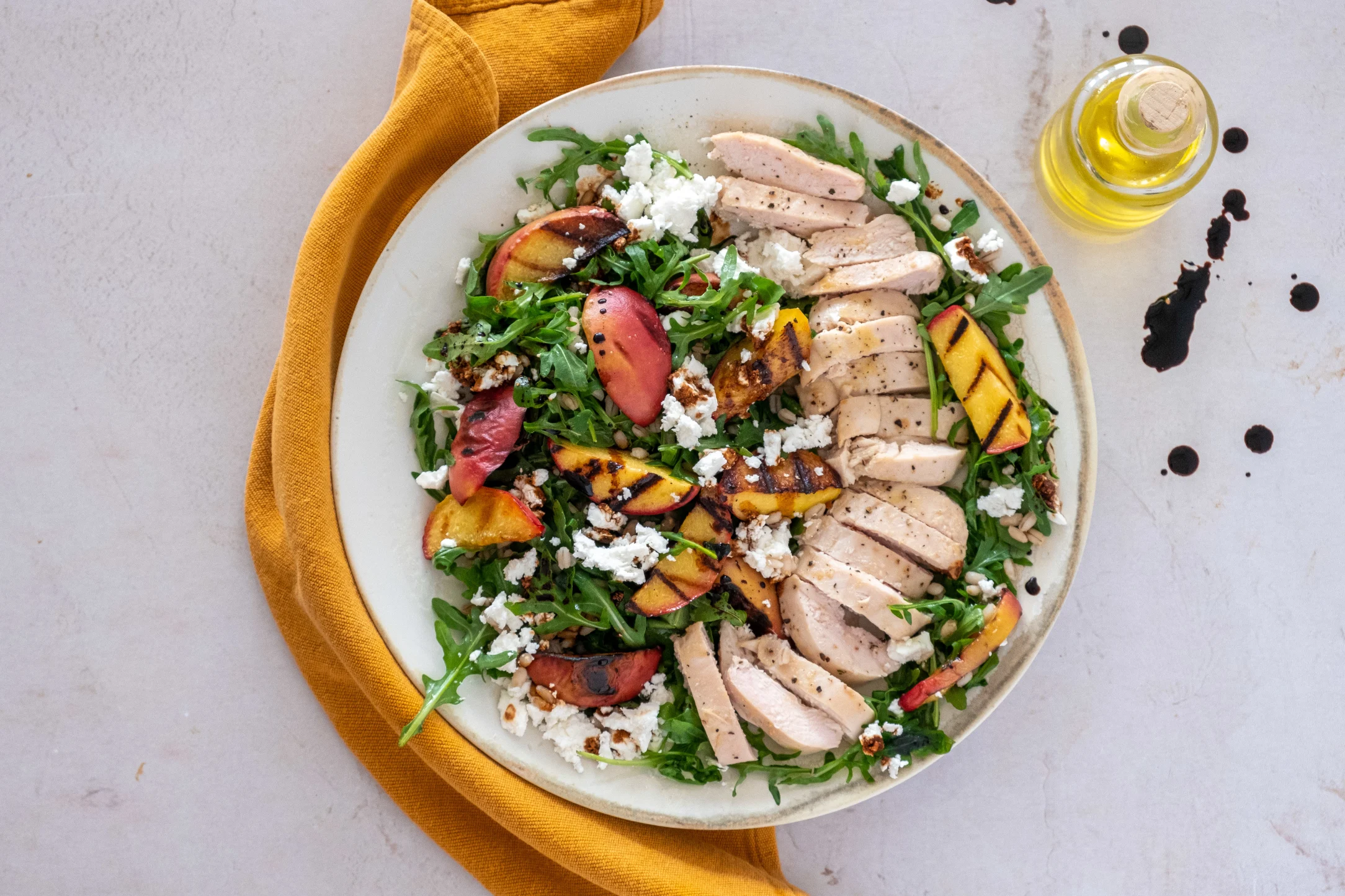 Mediterranean-style Grilled Chicken with Grilled Peach Salad and Pearl Barley
