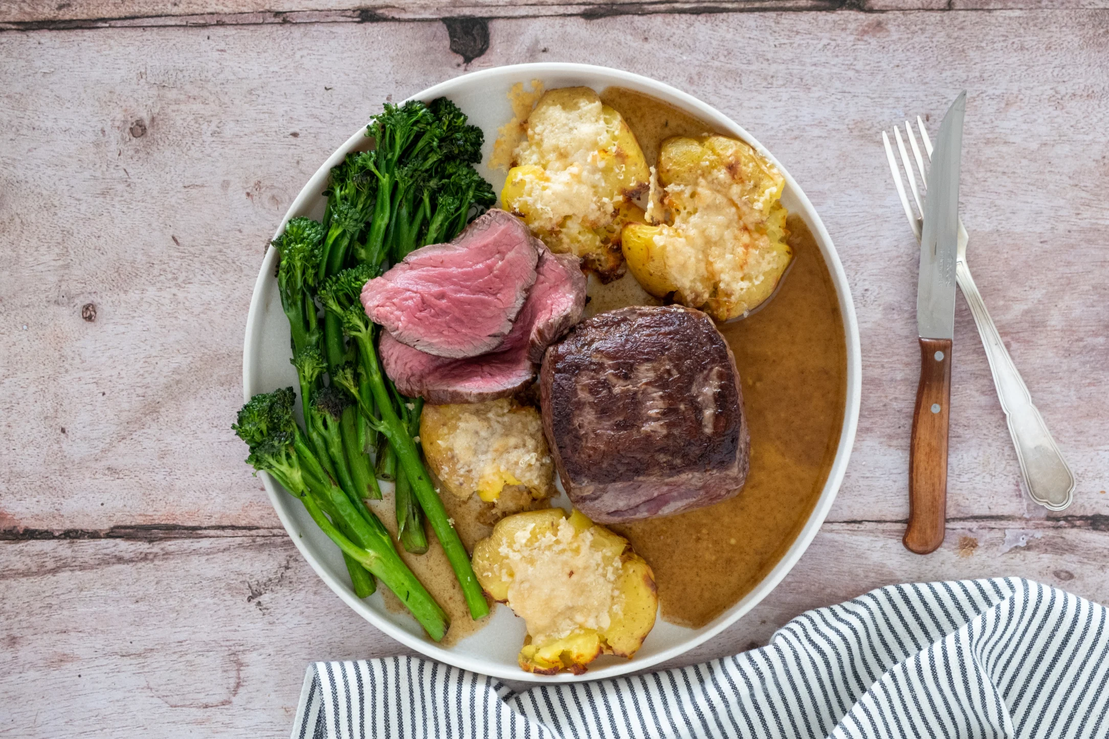 Tenderloin Fillet Steak with Parmesan Crusted Potatoes and Tenderstem Broccoli