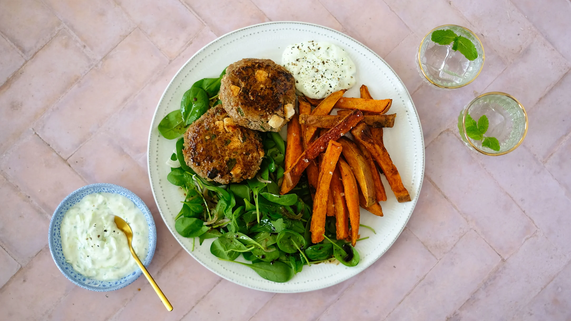 Minted Lamb and Feta Burgers with Sweet Potato Fries, Salad and Tzatziki