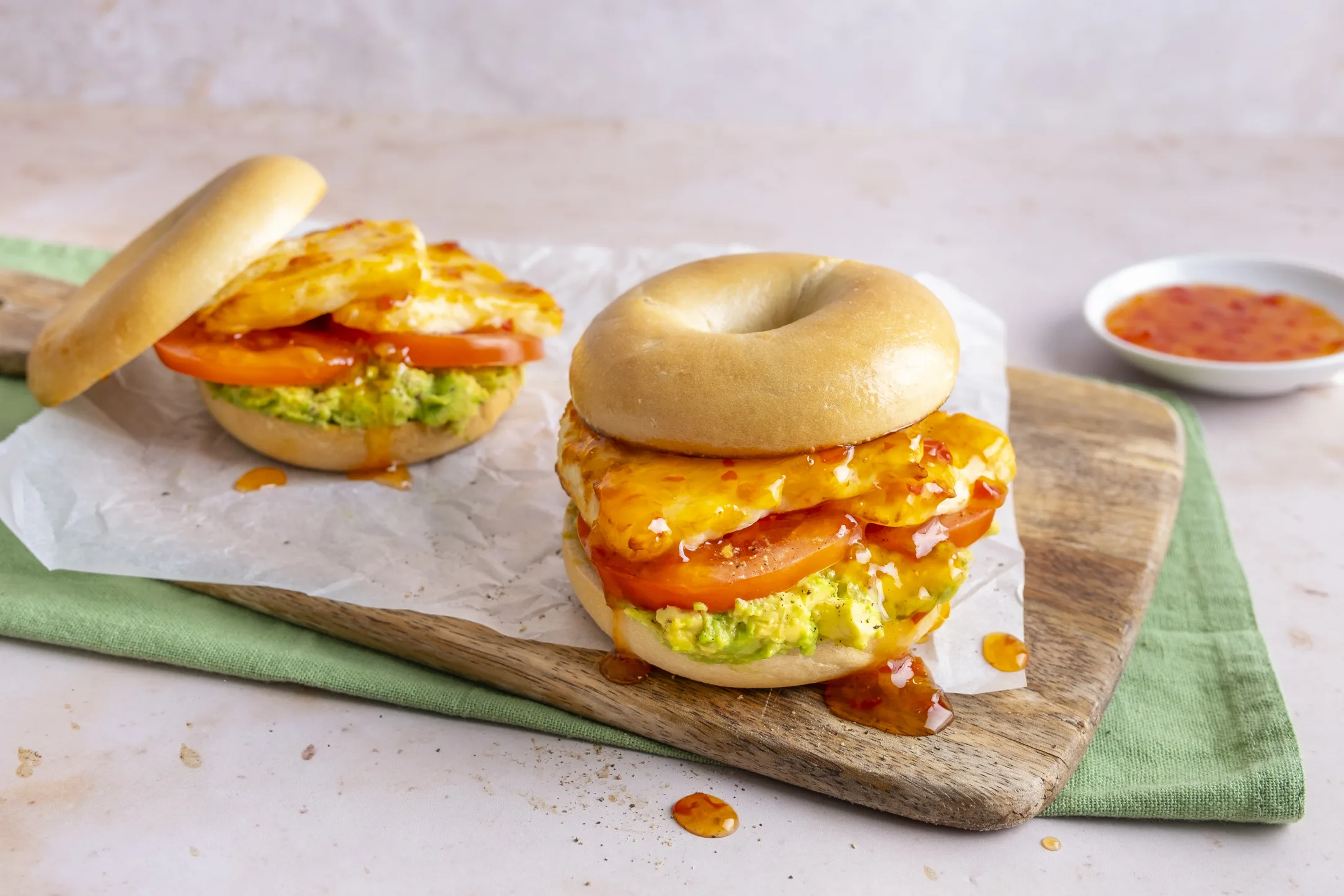 Halloumi and Avocado Bagel with Fresh Tomato and a Sweet Chilli Drizzle