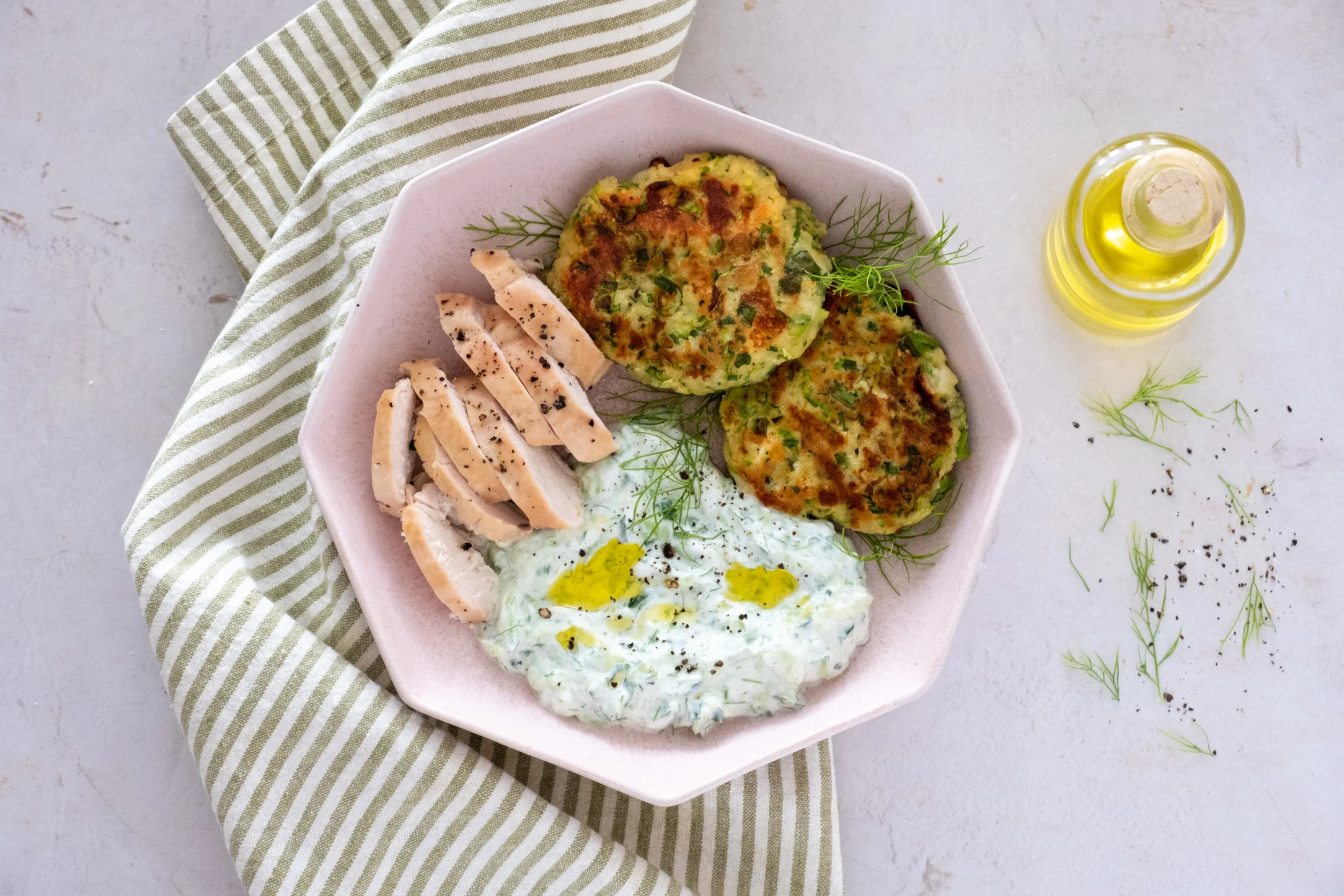 Mediterranean-style Grilled Chicken with Zucchini Fritters and Tzatziki