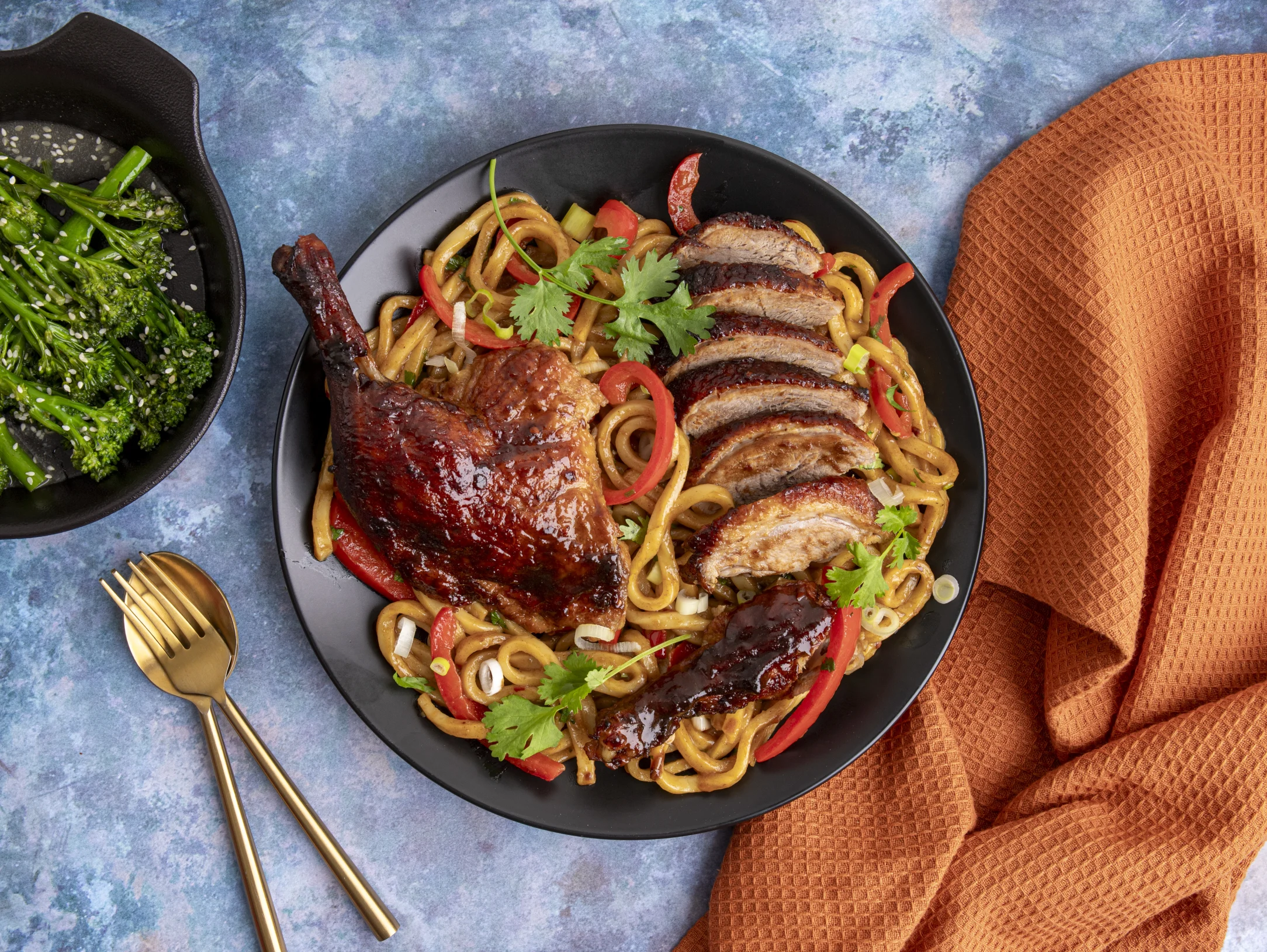 Hoisin Roasted Half Duck with Udon Noodles and Garlic Sesame Broccoli