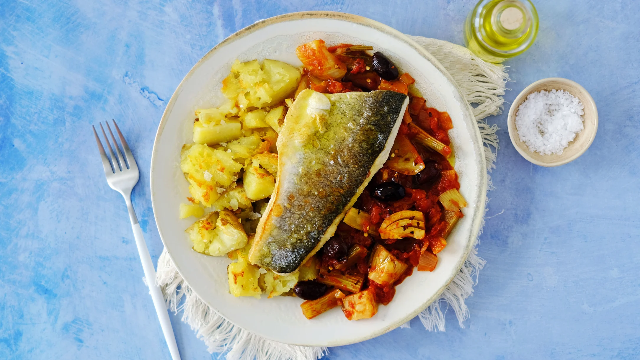 Sea bass with Mediterranean Fennel and Tomato Stew and Crushed Potatoes