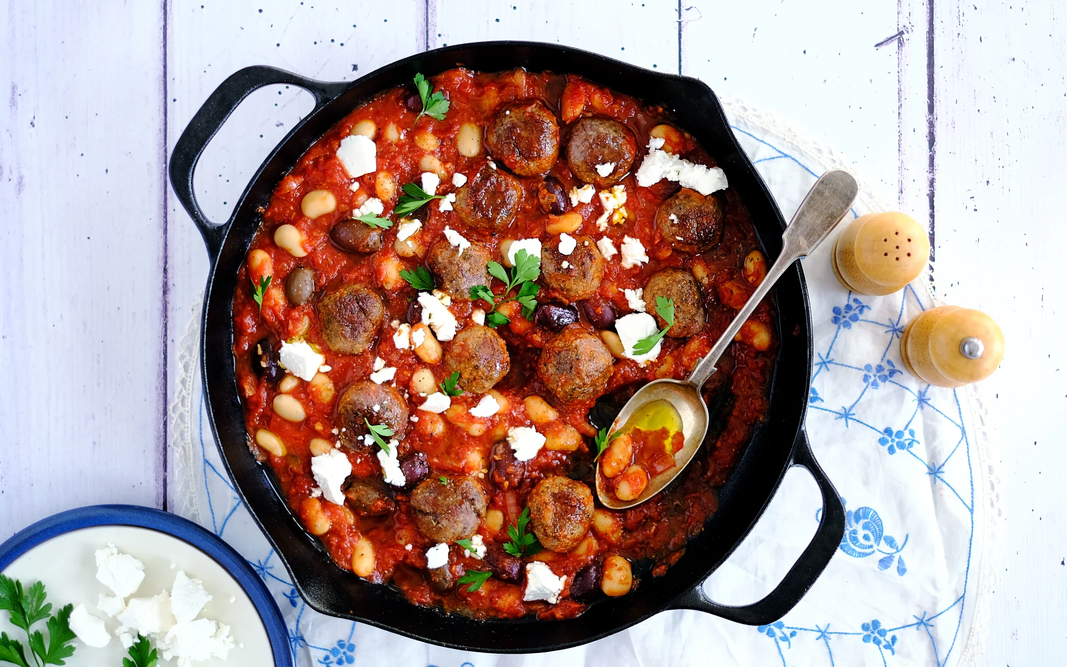Greek Lamb Meatballs with Bean Stew and Feta