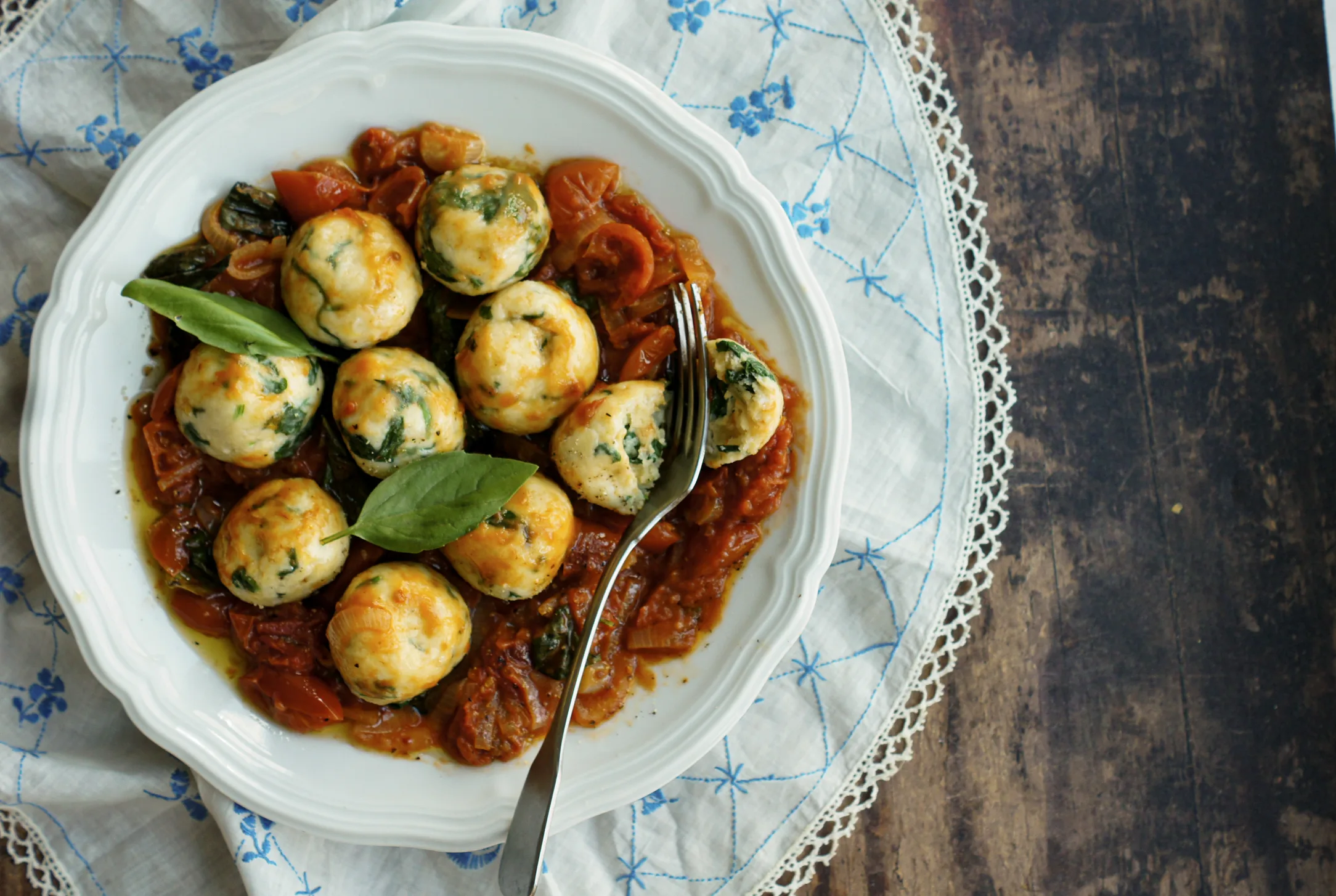 Spinach and Ricotta Gnudi in Buttery Tomatoes