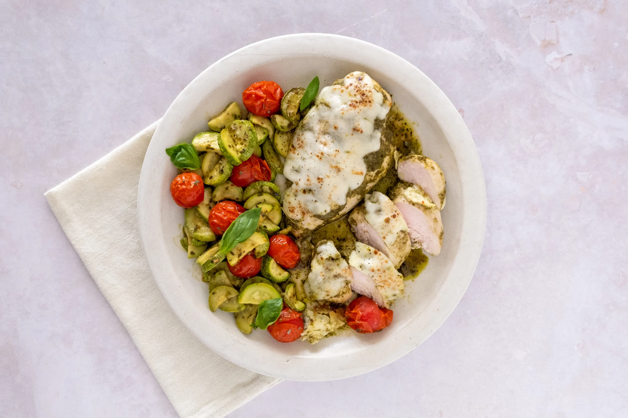 Mozzarella and Pesto Baked Chicken with Roasted Vegetables