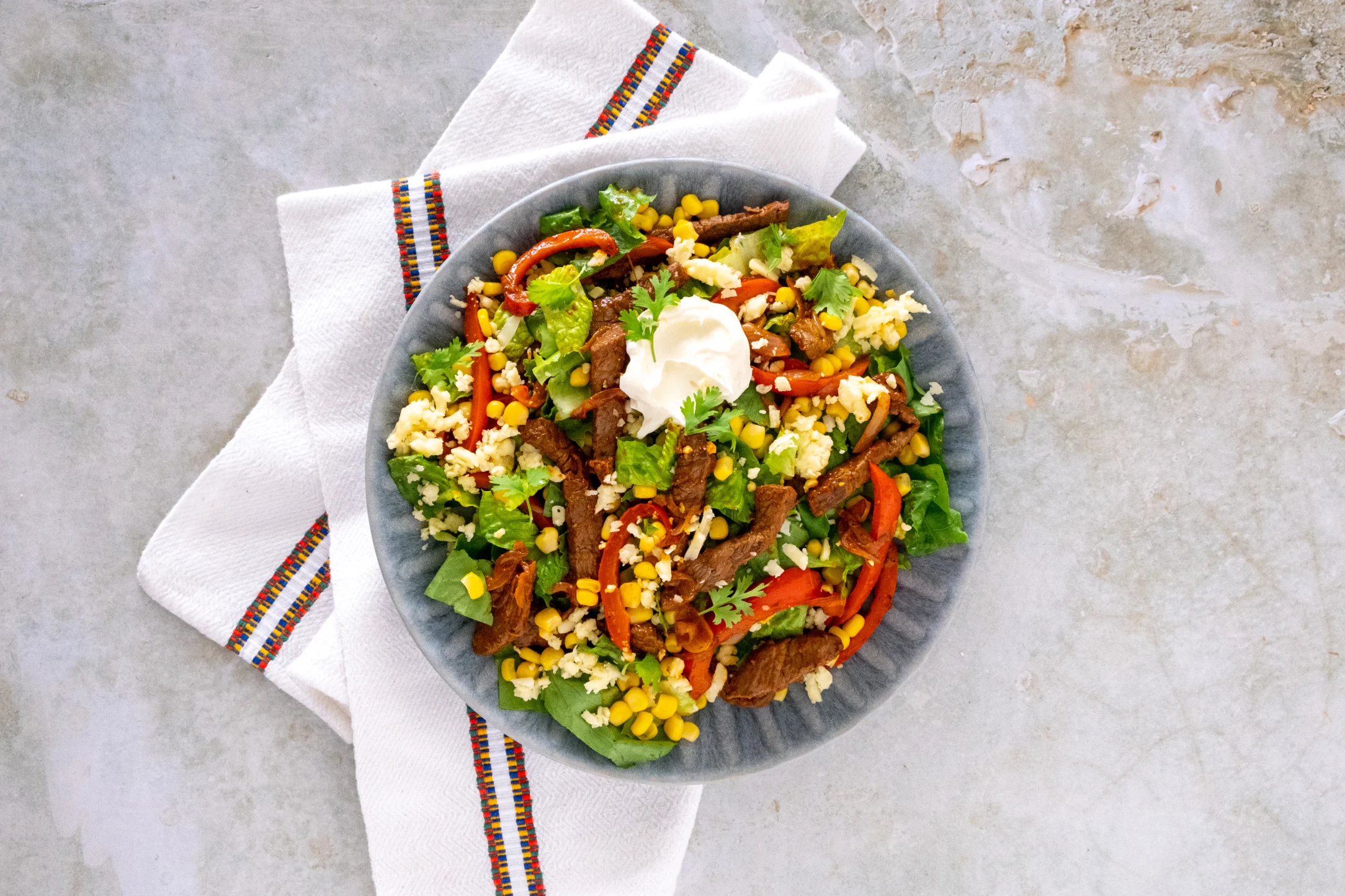 Steak Fajita Salad with Peppers, Corn and Sour Cream