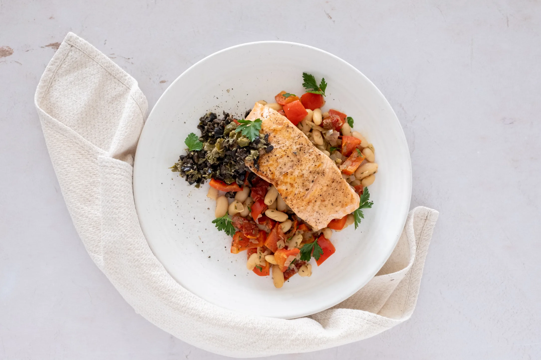 Pan-fried Salmon with White Bean Ragout and Olive Tapenade