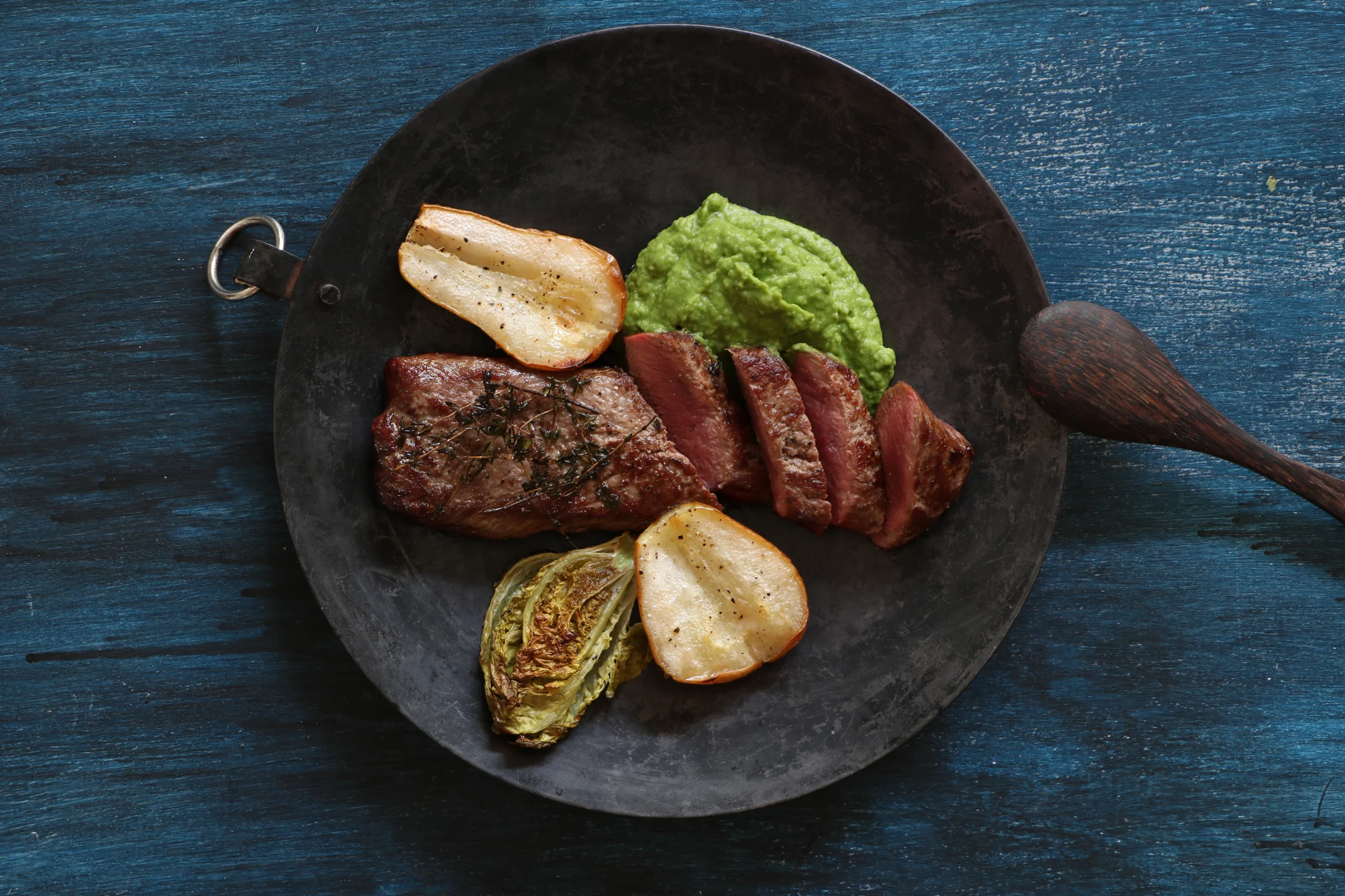 Tenderloin of Lamb with Roasted Baby Gem and Pear on a base of Green Pea Mash