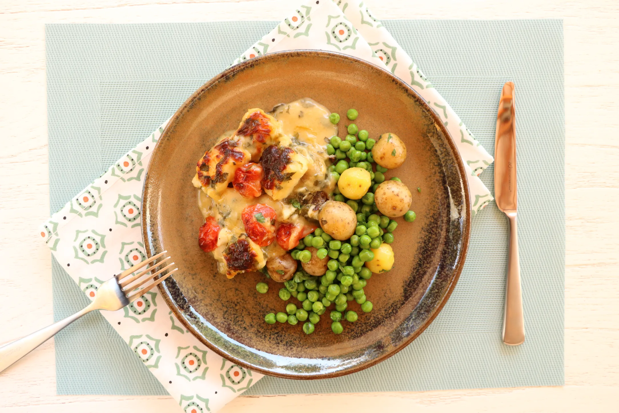 Baked Cod Mornay with Potatoes and Peas