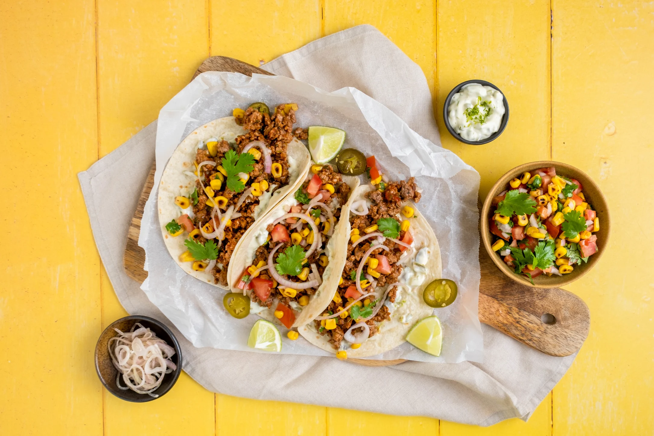 Spicy Chipotle Lamb Tacos with Sweetcorn Salsa and Jalapeño Crema