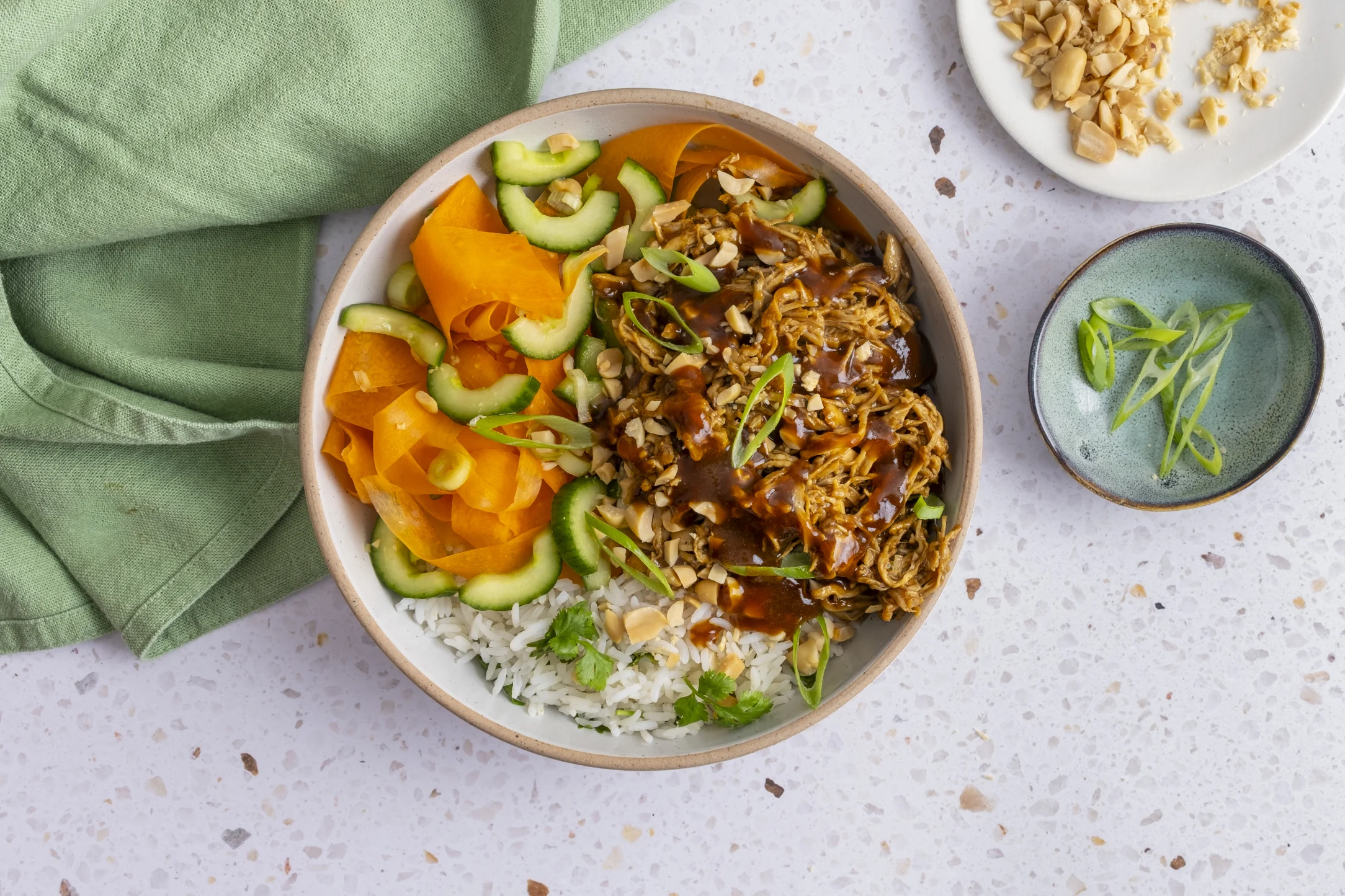 Hoisin Pulled Chicken Rice Bowl with Carrot and Cucumber Salad