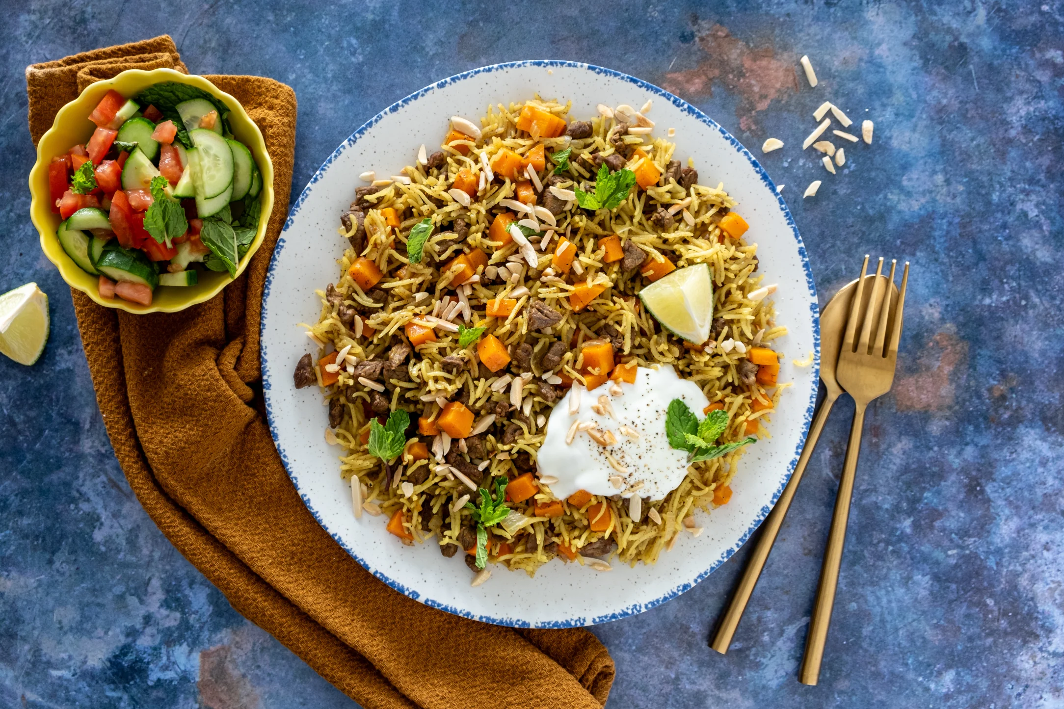 Iraqi Spiced Steak Strip and Carrot Rice with Cucumber Tomato Salad and Yogurt