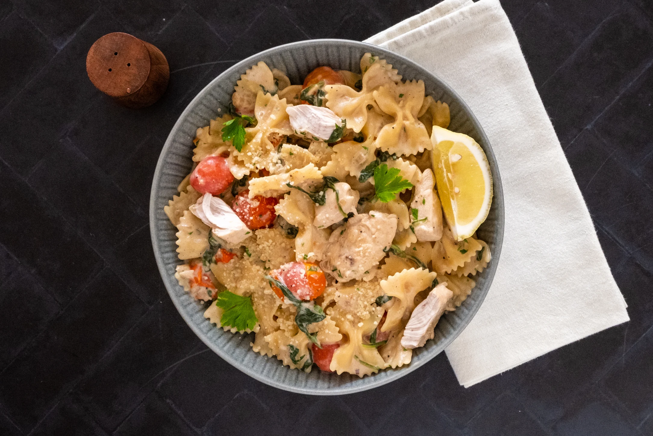 One-pot Lemon Chicken Farfalle Pasta with Baby Spinach and Cherry Tomatoes