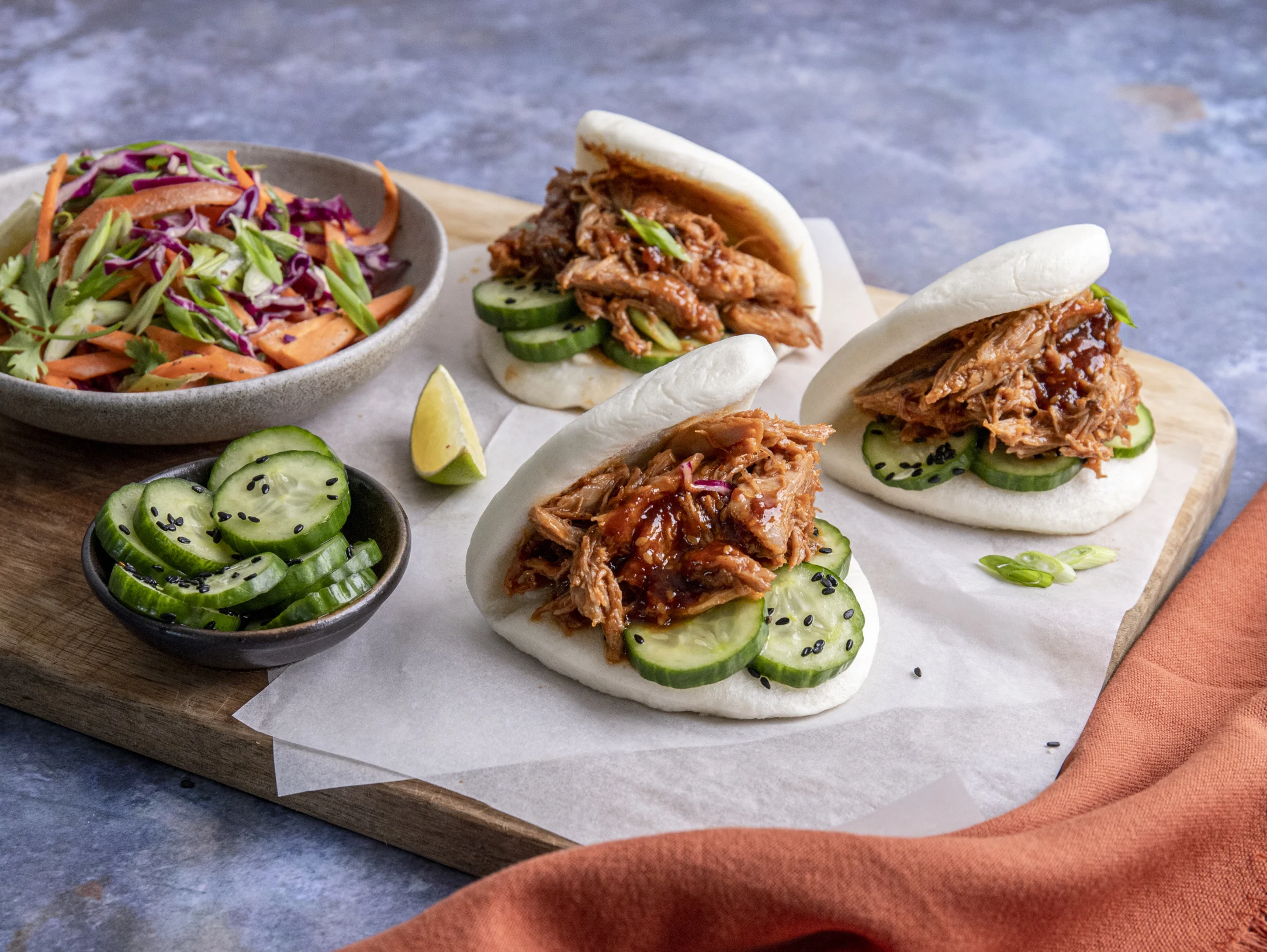 Korean Sticky Duck Bao Buns with Sesame Slaw and Pickled Cucumber