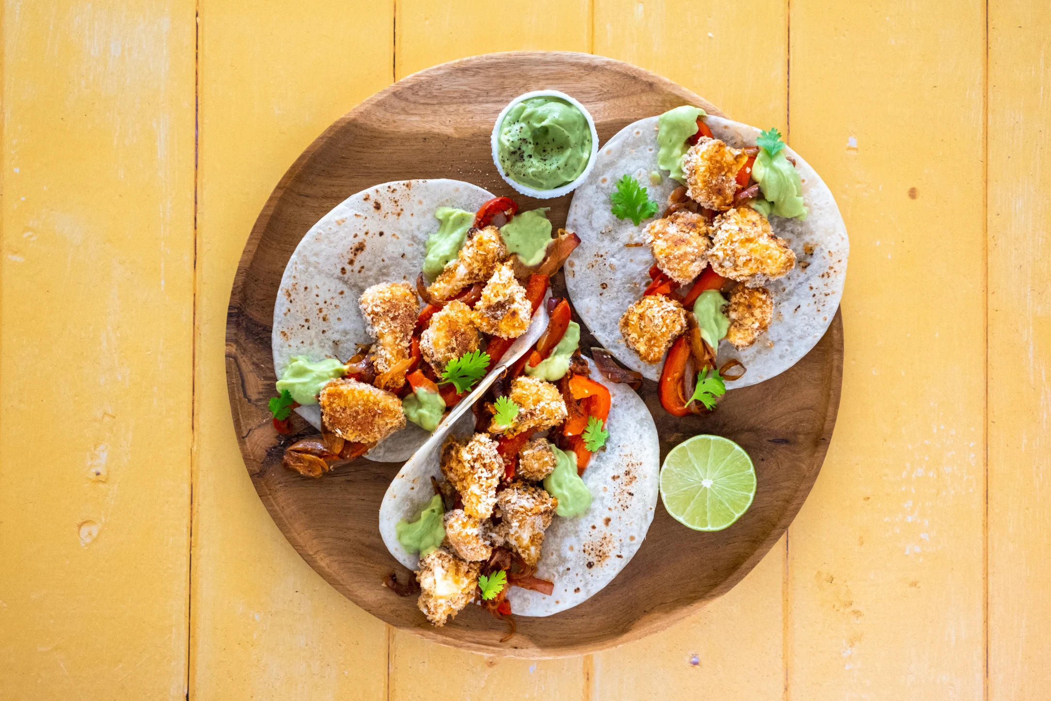 Crispy Cauliflower Tacos with Smoky Vegetables and Avocado Crema