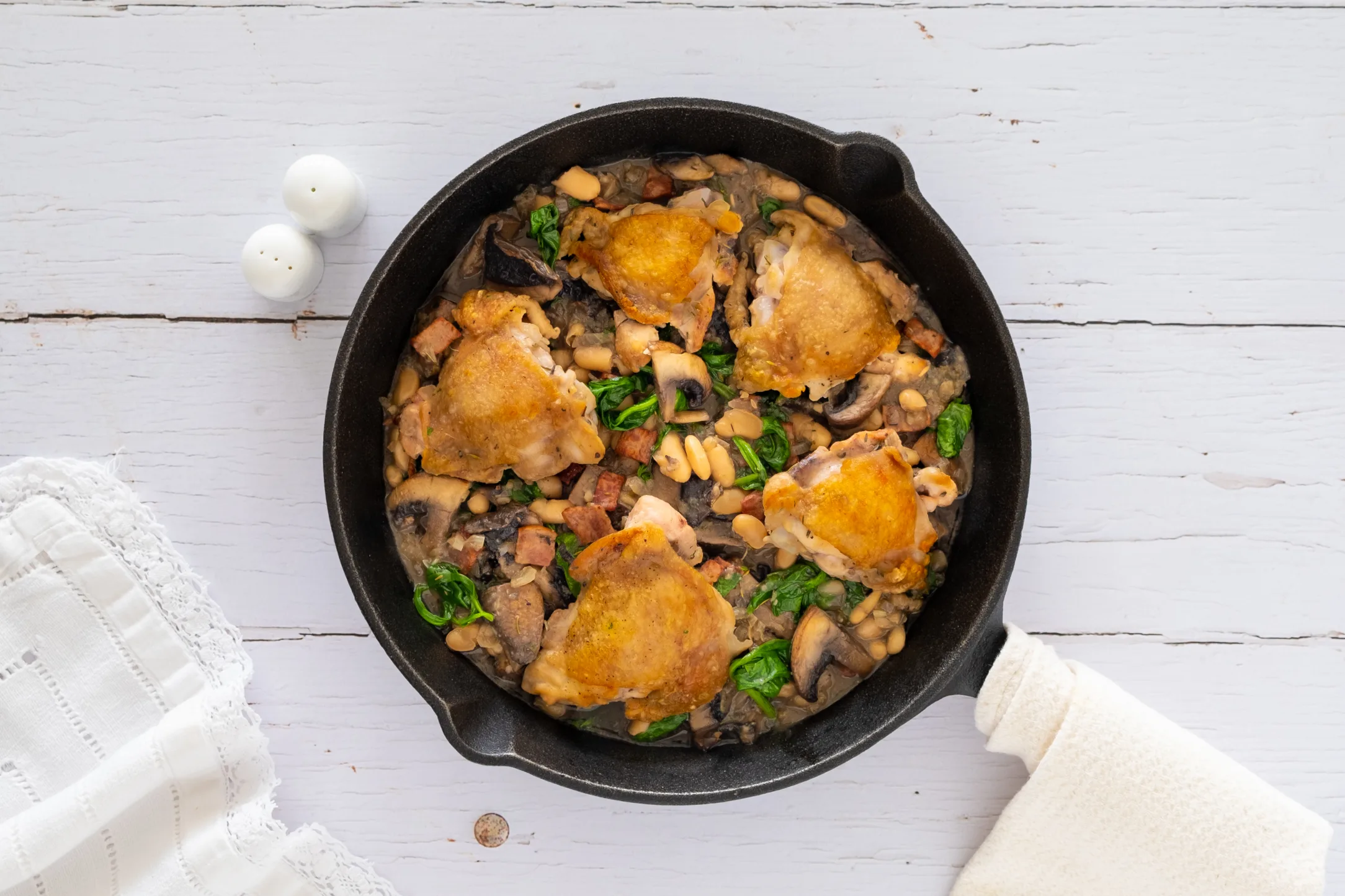 One-pan Chicken Cassoulet: White Bean Stew with Beef Bacon and Spinach