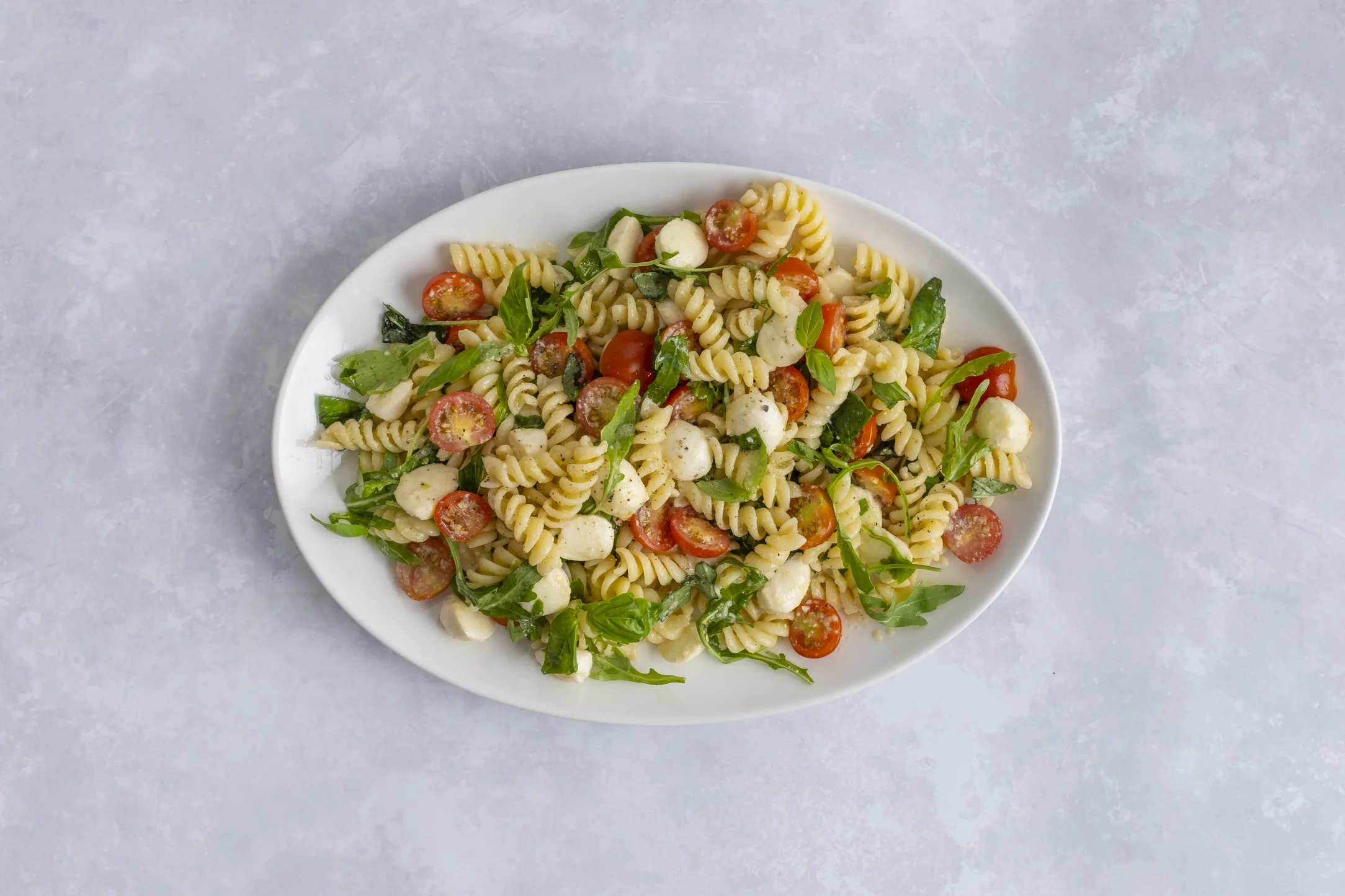 Mozzarella, Tomato and Rocket Pasta Salad with a Parmesan Vinaigrette