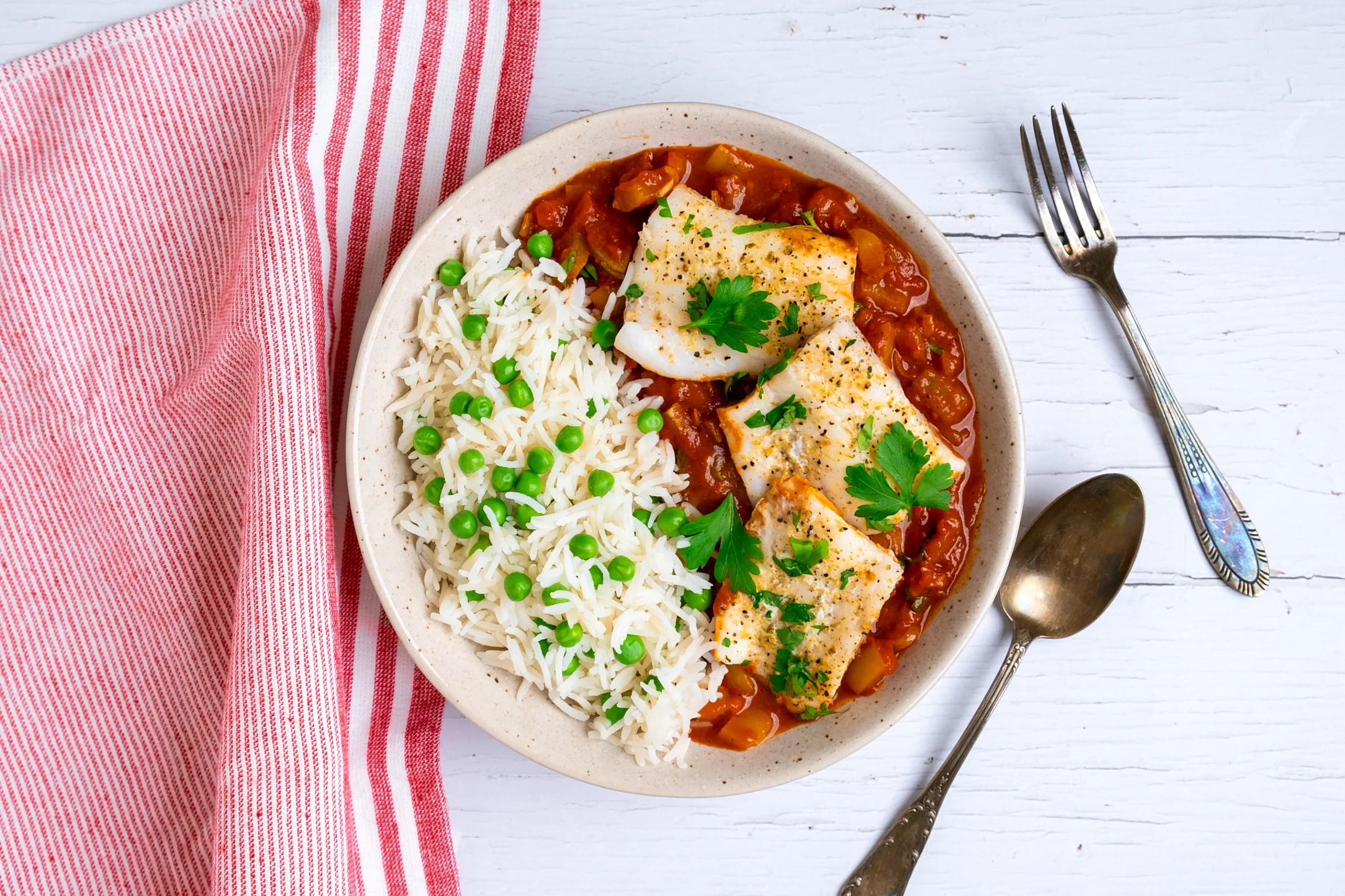 Spanish Paprika and Tomato Cod with Green Pea Rice