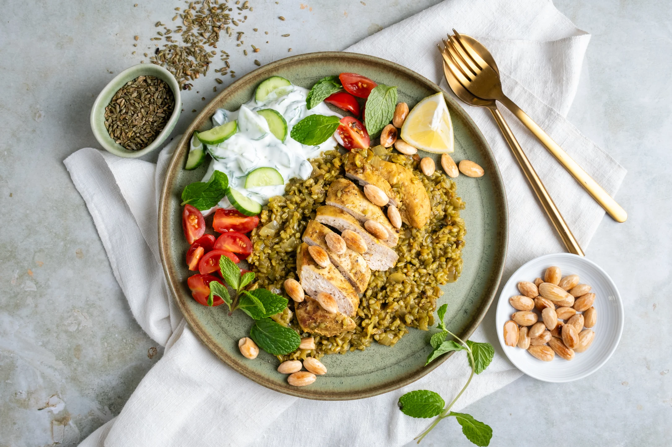 Baharat Spiced Chicken and Freekeh Pilaf with Cucumber Yogurt Salad
