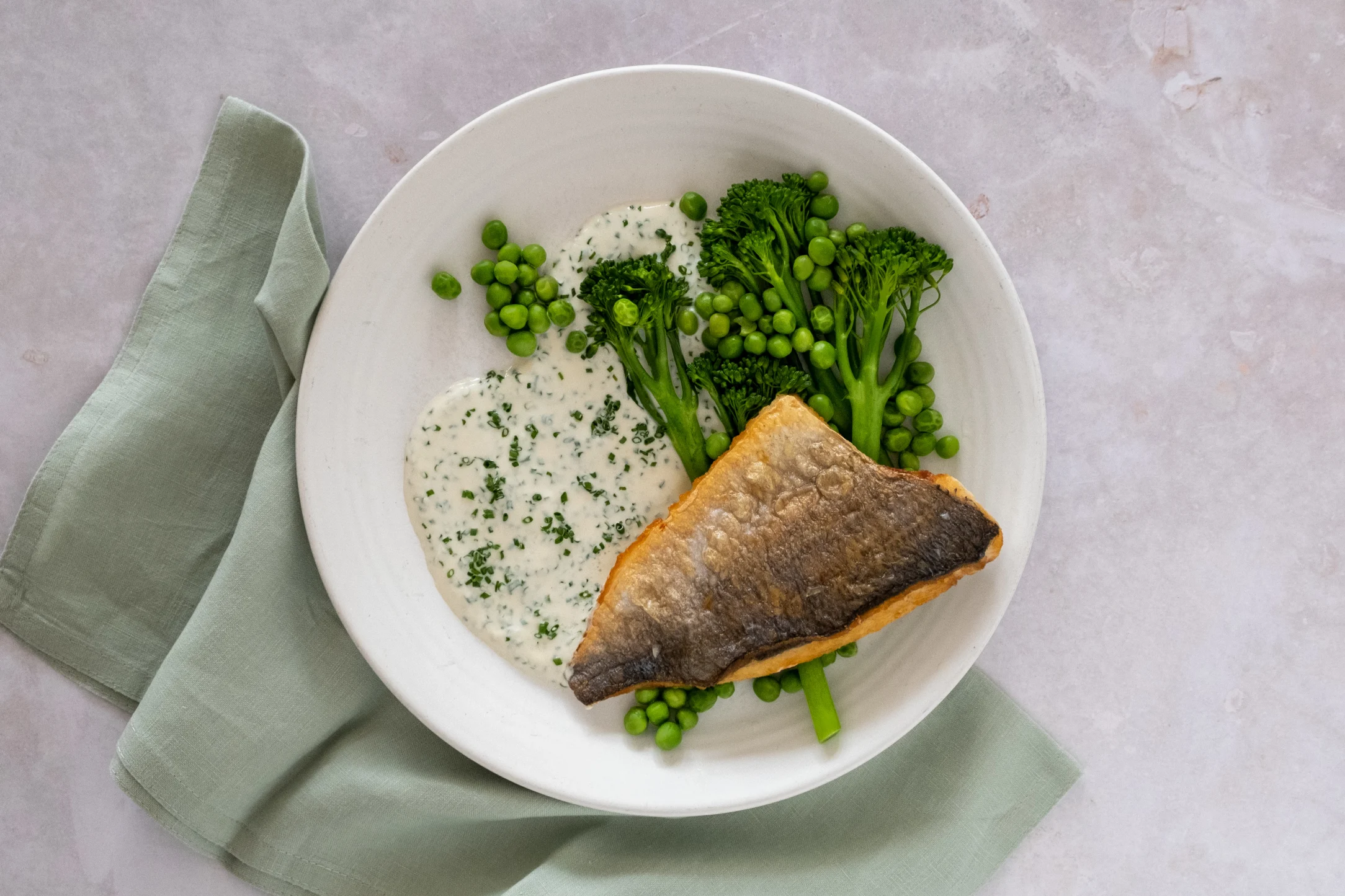 Seabream with Creamy Chive Sauce, Tenderstem Broccoli and Green Peas