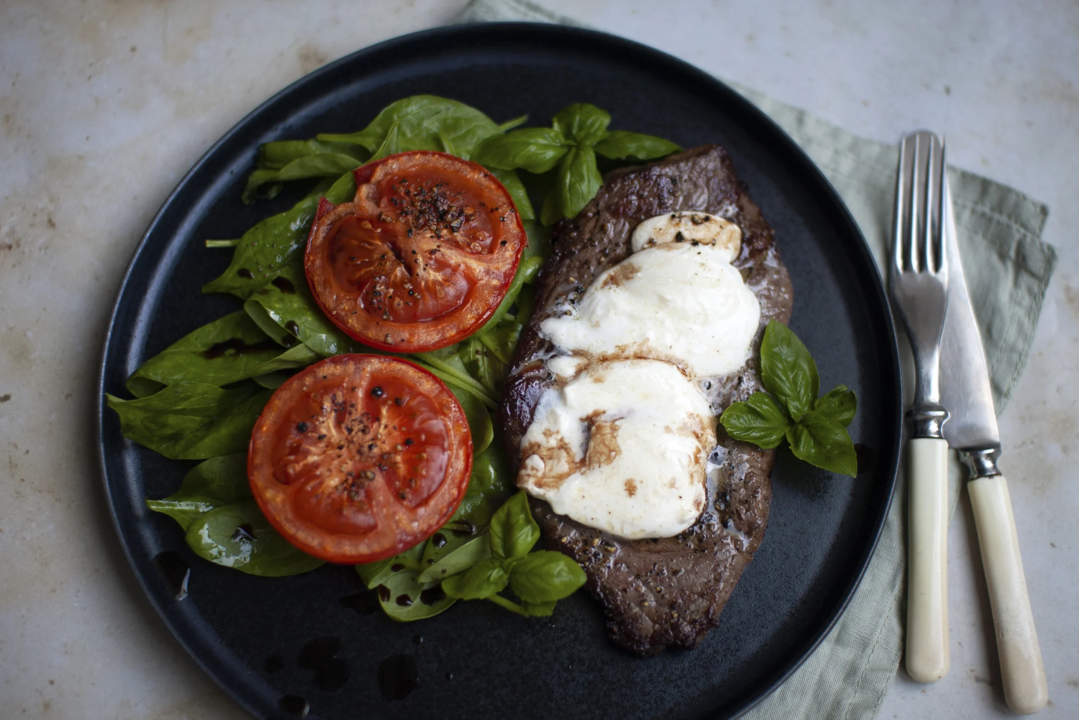 Mozzarella Steaks with Baked Tomatoes and Baby Spinach