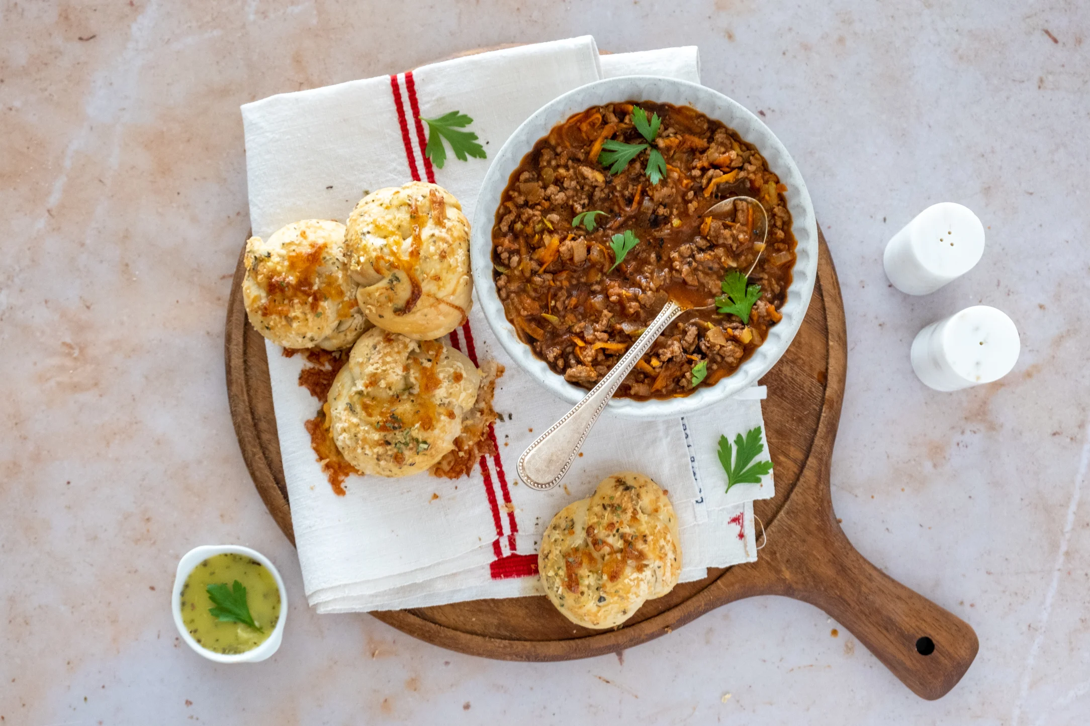 Cheesy Garlic Knots with Bolognese Stew