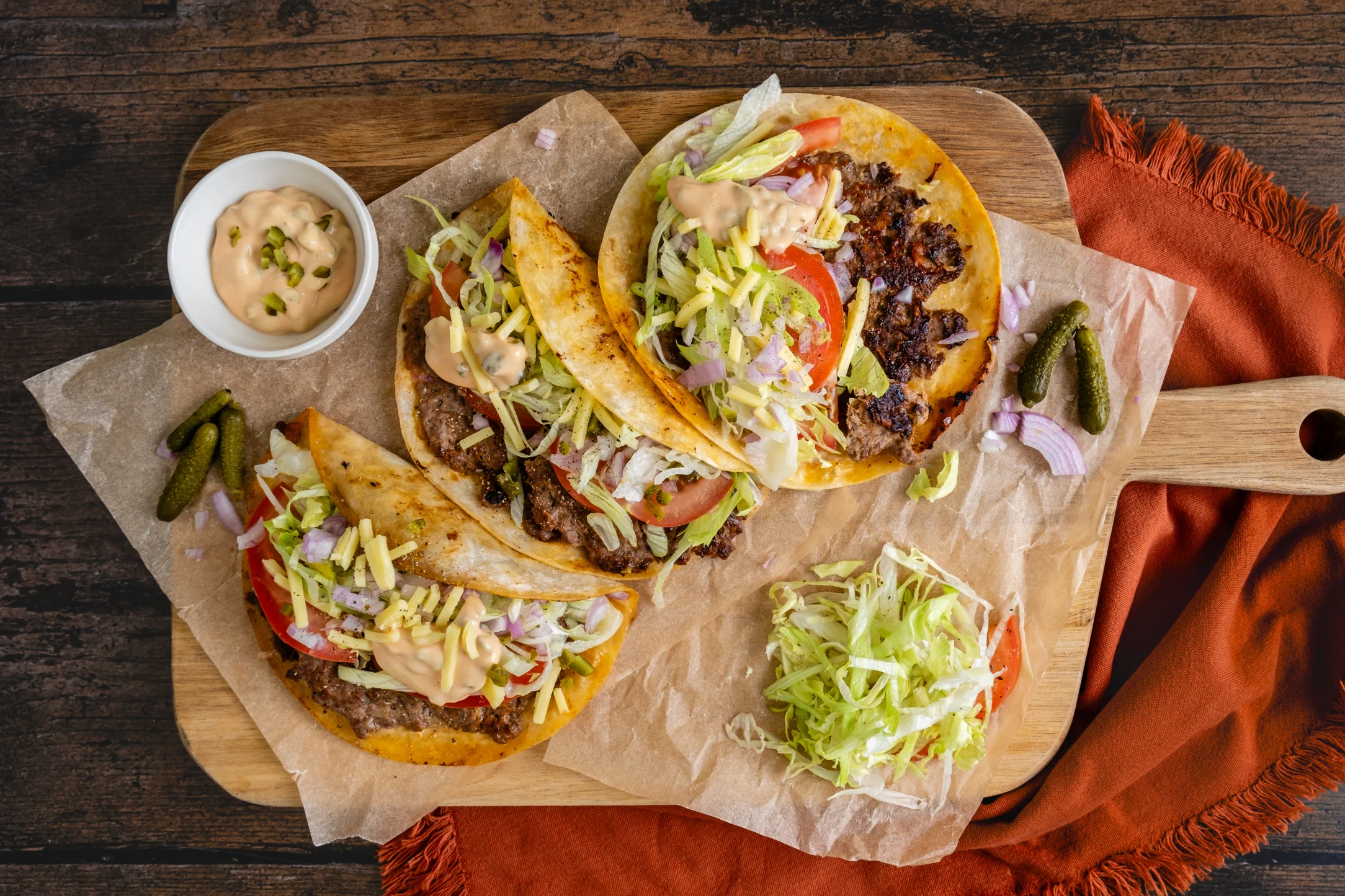 Smash Beef and Cheddar Tacos with Mac Sauce and Toppings