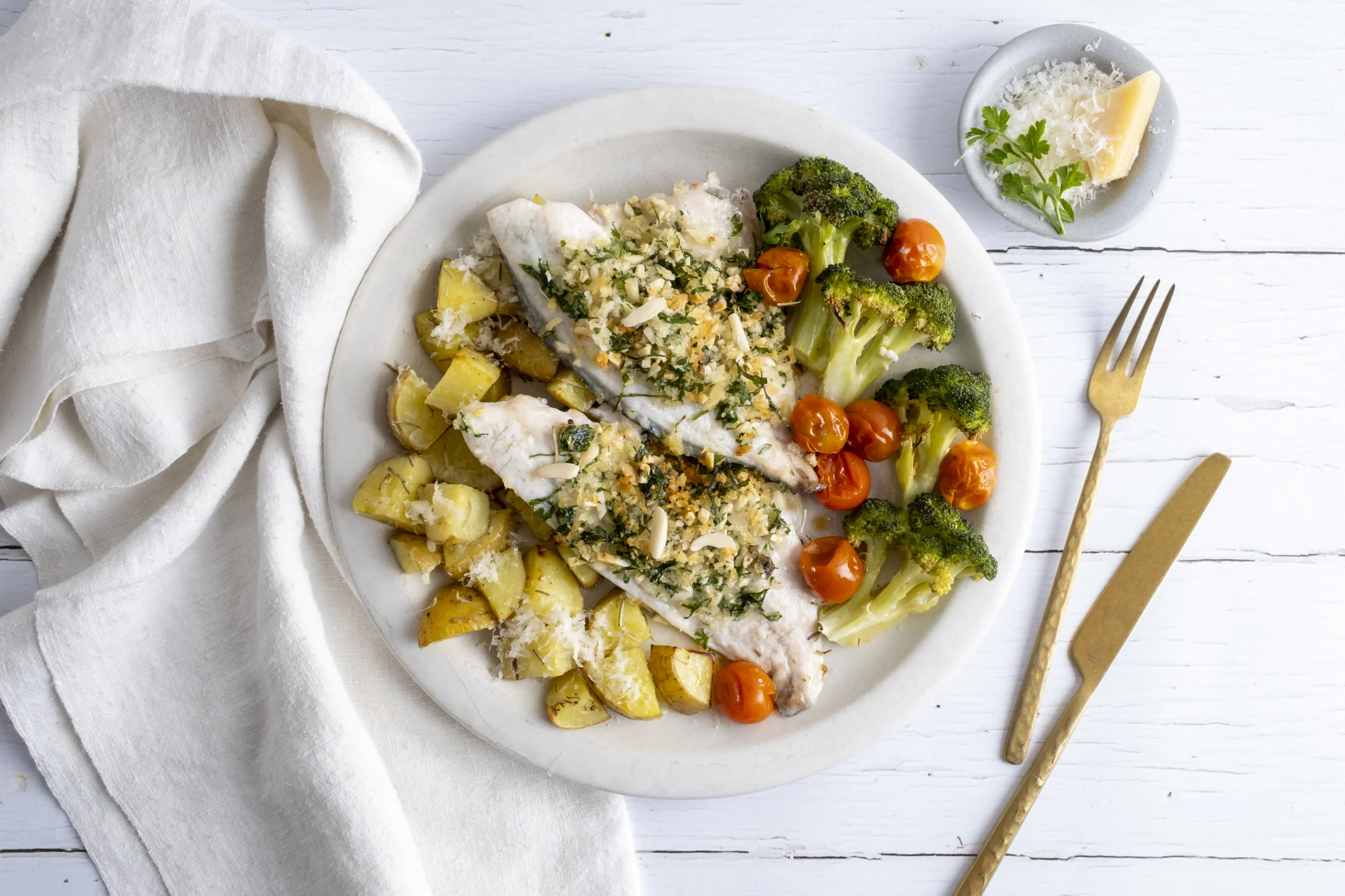 Almond-Crusted Seabream with Parmesan Potatoes, Broccoli, and Blistered Tomatoes
