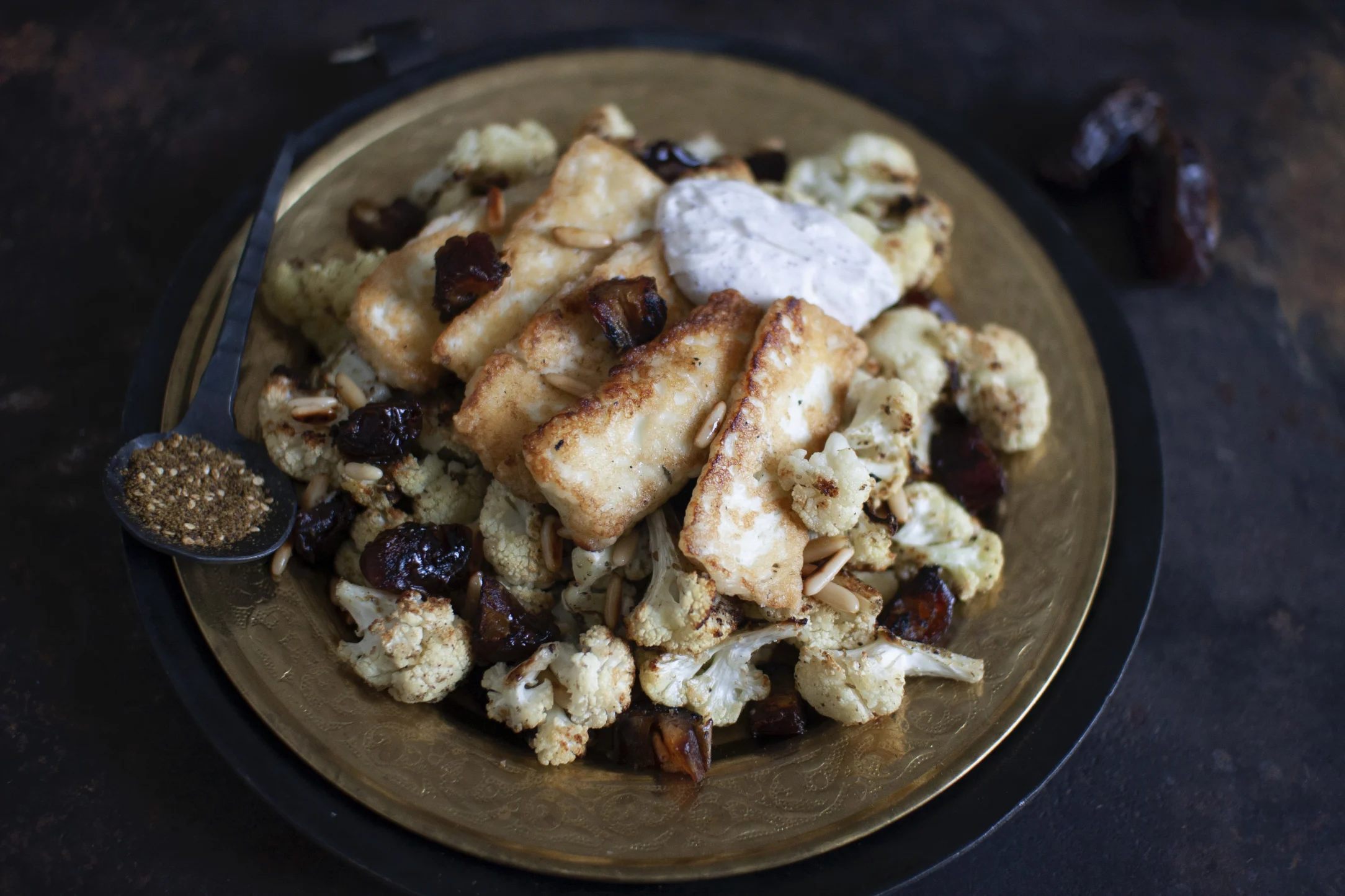 Halloumi with Zaatar Roasted Cauliflower, Dates and Pine Nuts