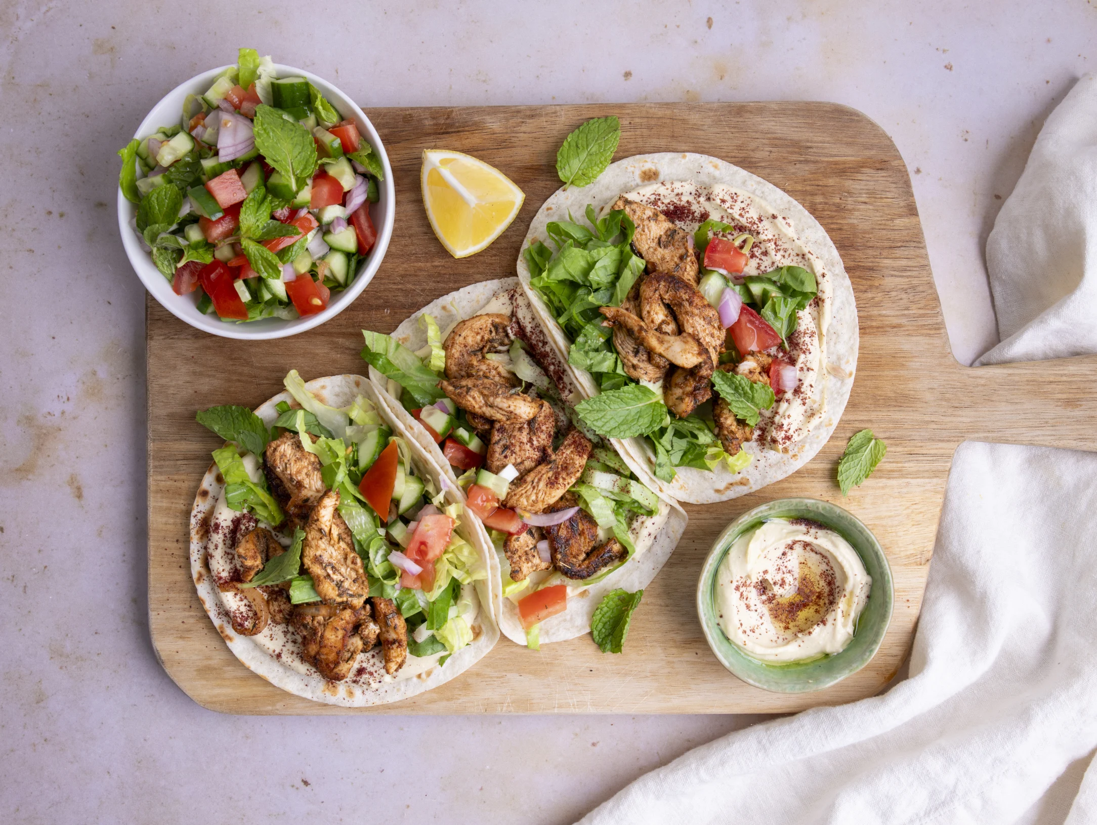 Chicken Shawarma Tacos with Hummus and Tomato Cucumber Salad