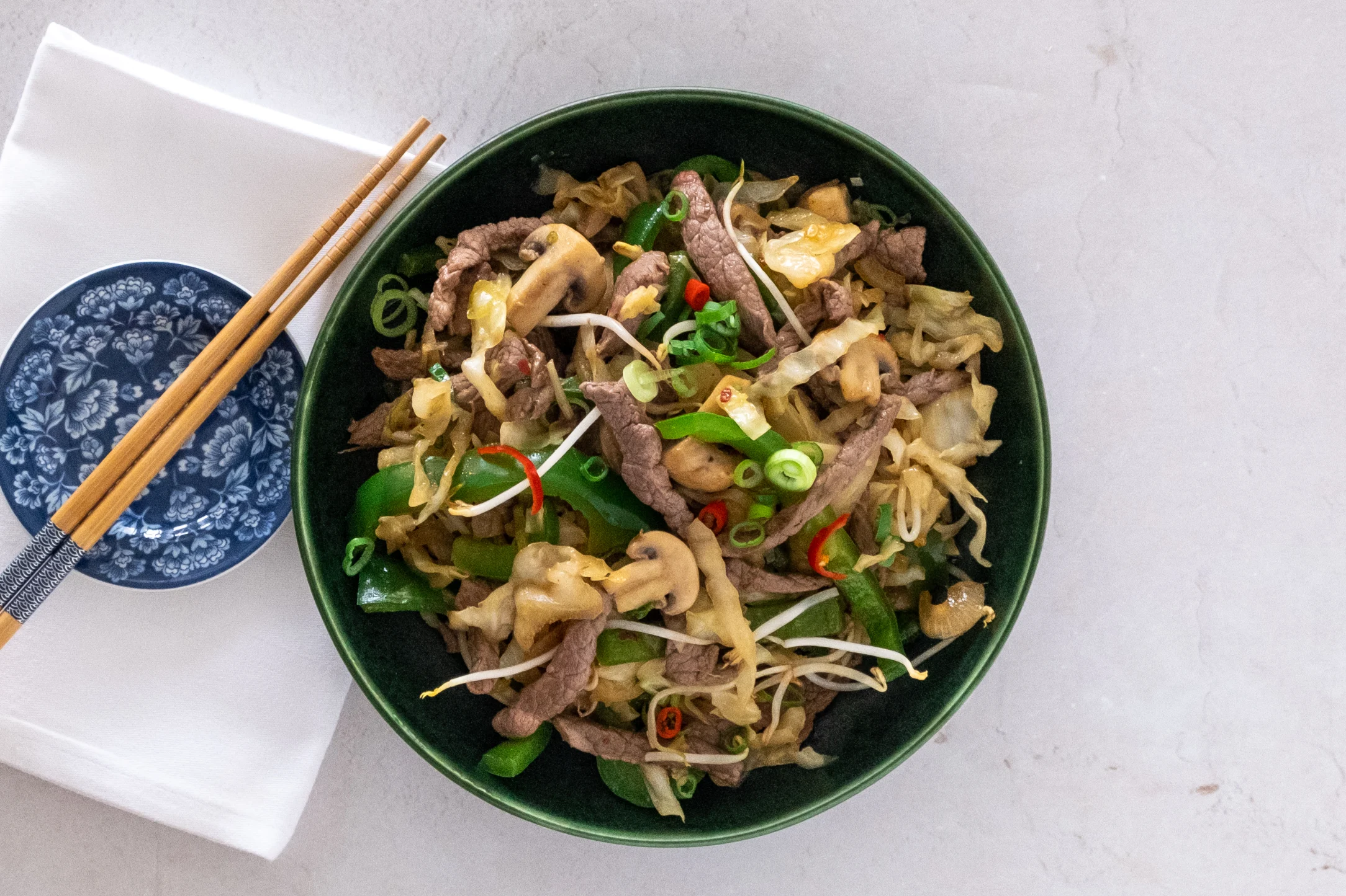 Spicy Beef Stir-fry with Cabbage, Peppers and Mushrooms