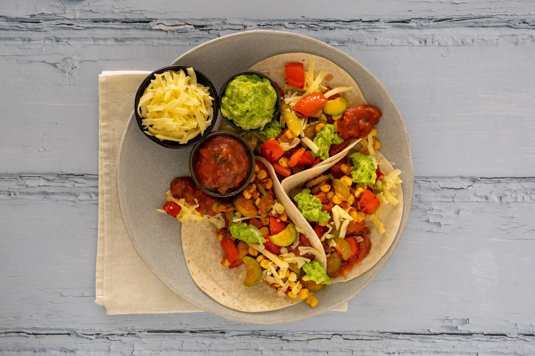 Cheesy Veggie Tacos with Avocado and Tomato Salsa