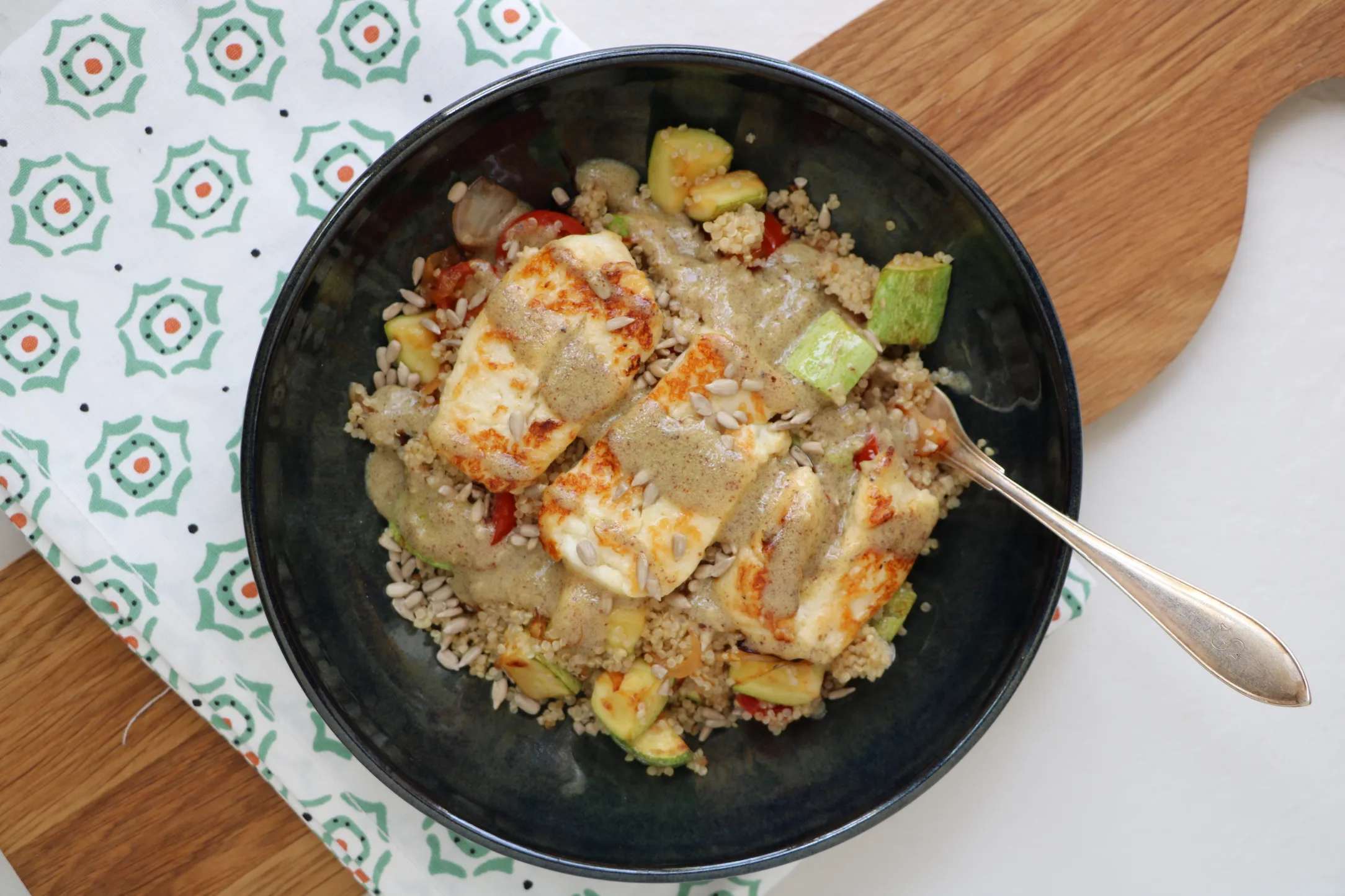 Warm Quinoa and Zucchini Salad with Grilled Halloumi and Sunflower Seeds