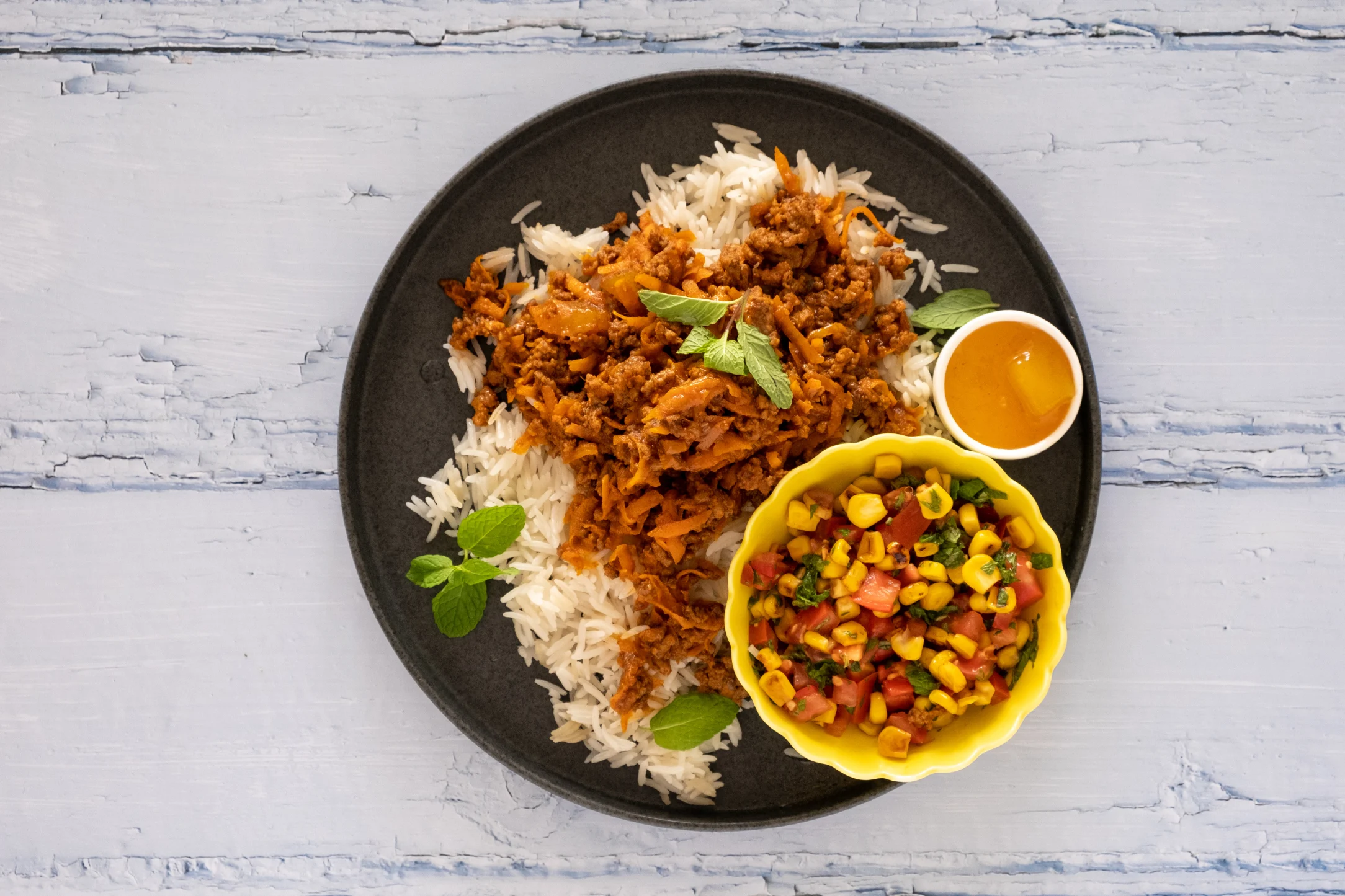 Caribbean Beef with Coconut Rice and Tomato Corn Salsa