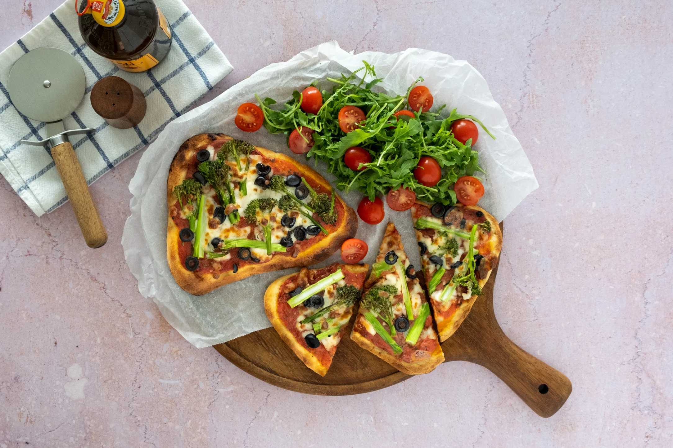 Tenderstem Broccoli and Black Olive Naan Pizza with Tomato and Rocket Salad
