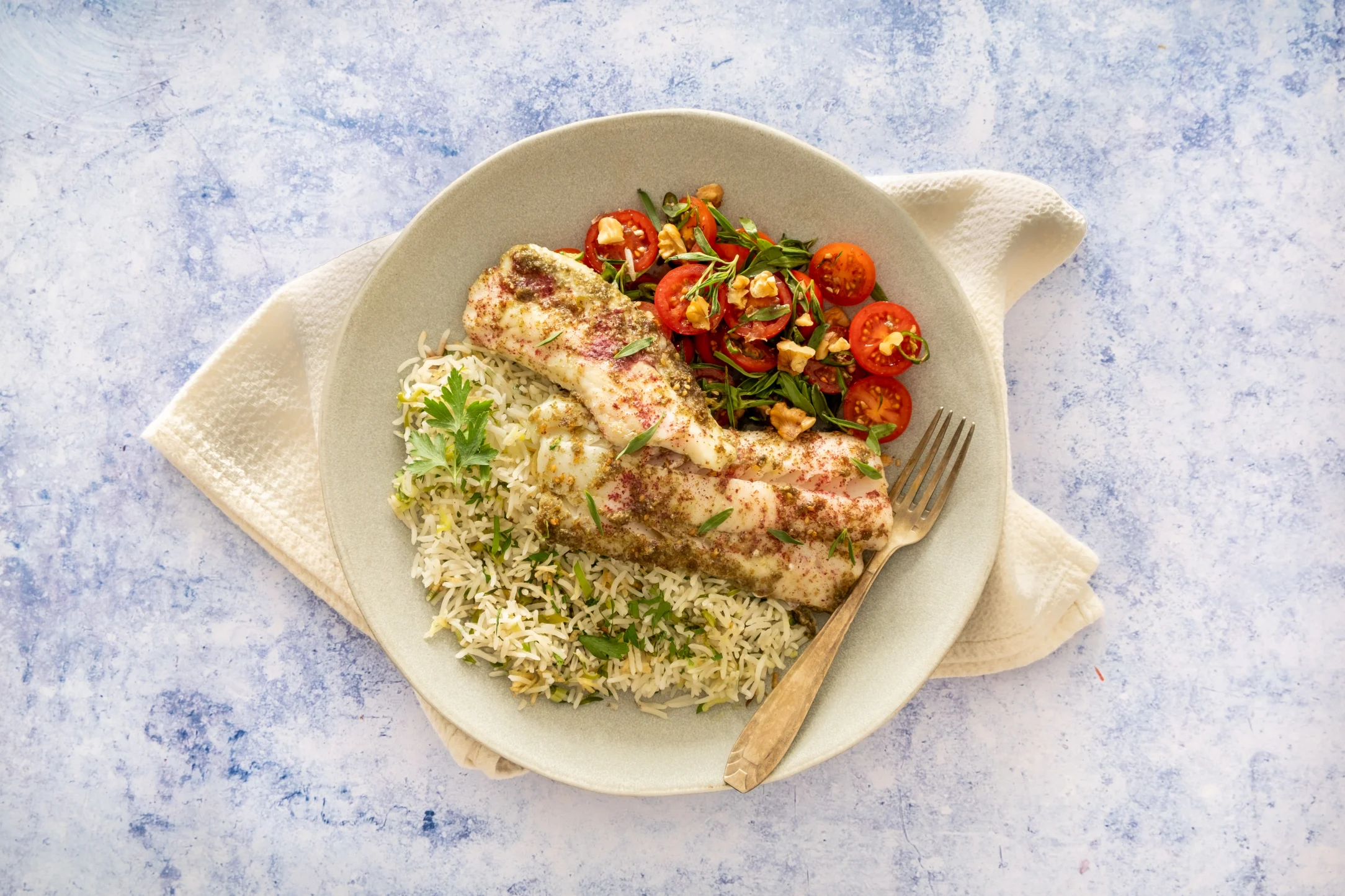 Zaatar Baked Pollock with Tomato, Chilli, Walnut Salad and Herby Rice