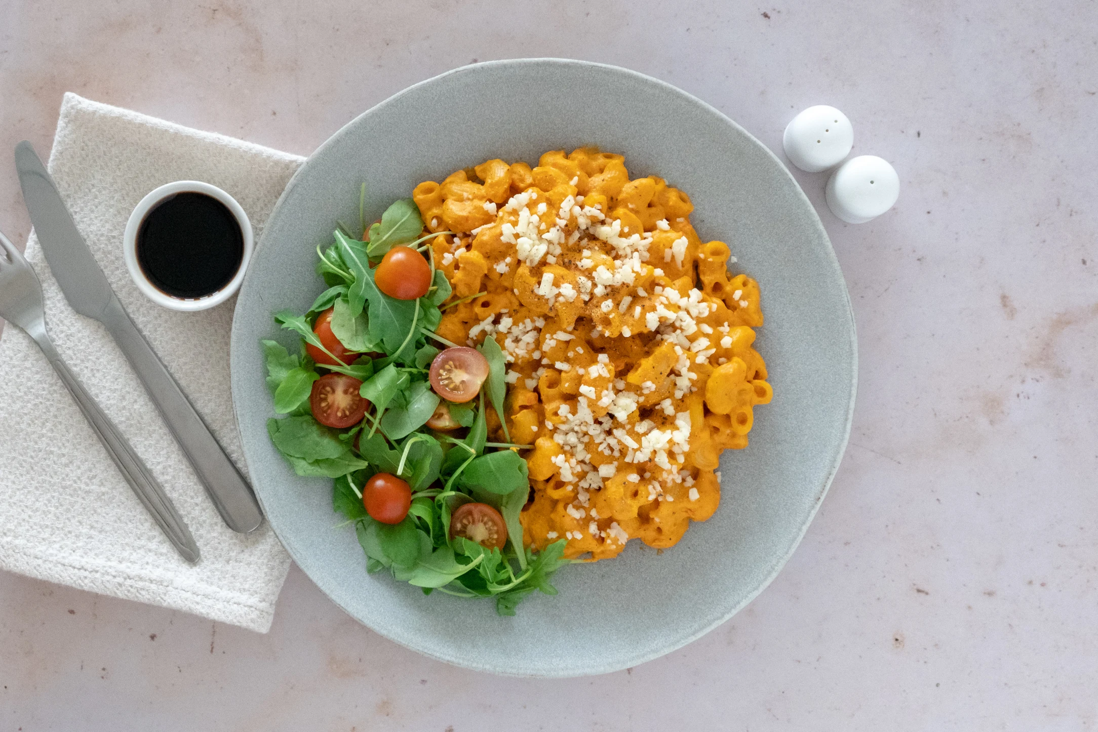 Mac and Cheeze with Vegan Mozzarella and a Cherry Tomato and Rocket Salad